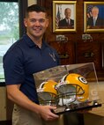 Recruiting Station Milwaukee said farewell to Capt. Nicholas Borns, the outgoing Executive Officer, with a surprise – a signed helmet from his favorite team, the Green Bay Packers.  Capt. Borns will attend a career course in Fort Lee, Va., before moving on to his next duty station. 