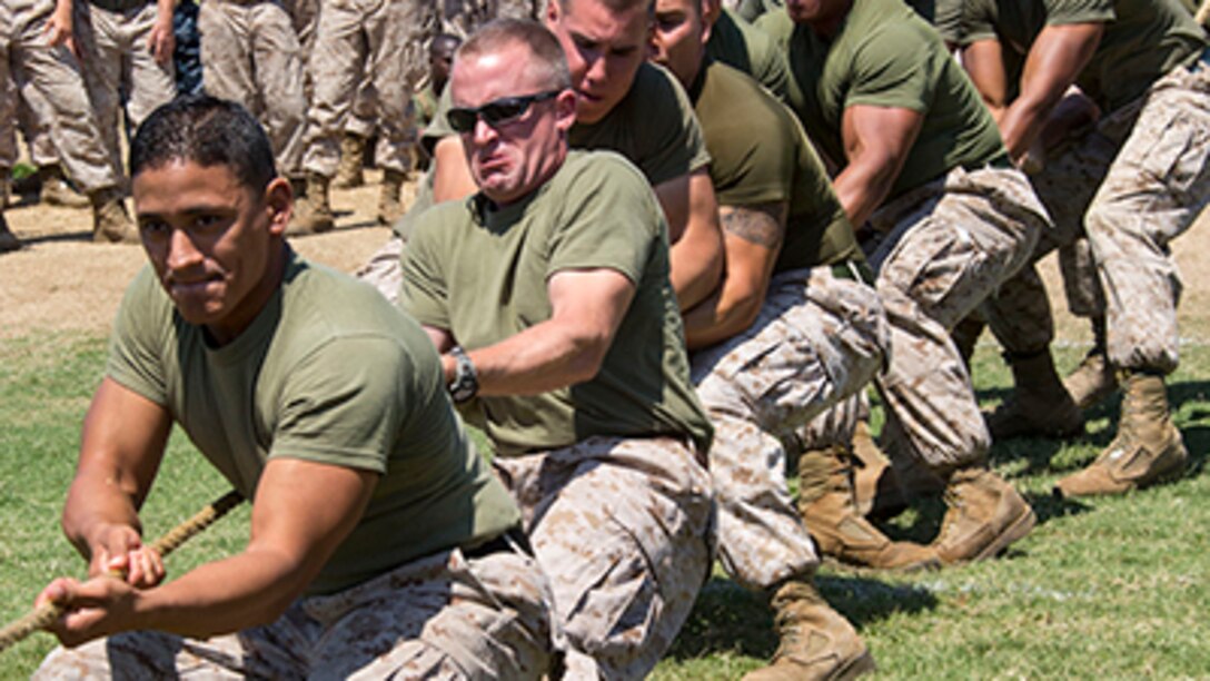 Marines with Marine Aviation Logistics Squadron 11 participate in tug of war at the first Marine Aircraft Group 11 field meet aboard Marine Corps Air Station Miramar, Calif., Aug. 22. More than 1,500 Marine participated in the events of the field meet.