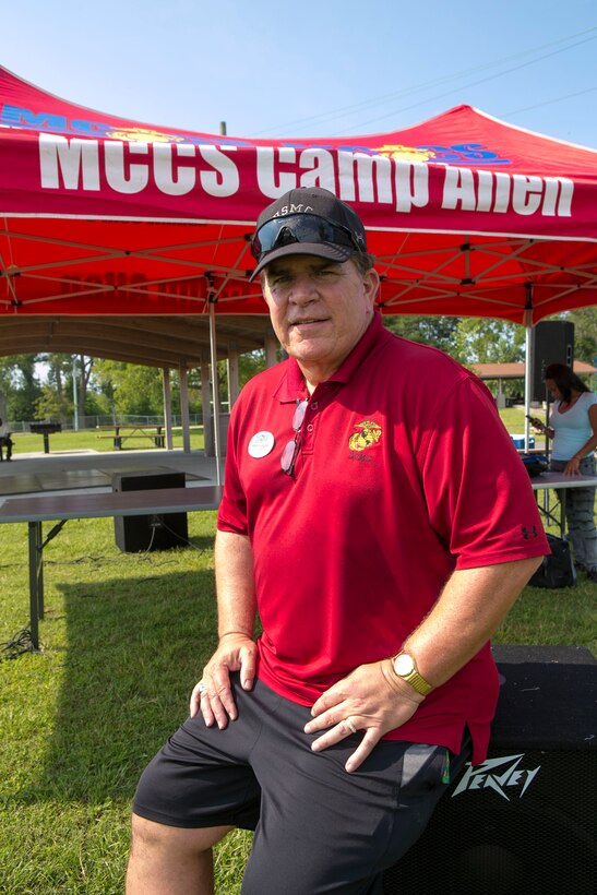 The director of Marine Corps Community Services Camp Allen, Michael Flanary, takes a break for a photo during the 4th annual OOH-RAH Day Summer Bash Aug. 23. Flanary served as director for the past eight years and this event was his last before retirement.

According to MCCS Camp Allen, his contributions, good business sense and leadership directly contributed to the success of the organization.

"We wish him and his wife the very best," said Karina Phillips, deputy director, MCCS Camp Allen.