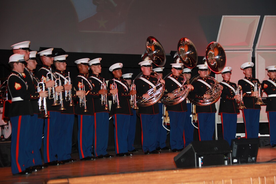 The 2nd Marine Division Band begins the Fourth of July concert in the Base Theatre aboard Marine Corps Base Camp Lejeune, July 2, 2013. "(When) you're finally there, it's like game day; it's always fun," said Staff Sgt. Steven J. Baltzer the rhythm section chief and Strasburg, Pa., native.