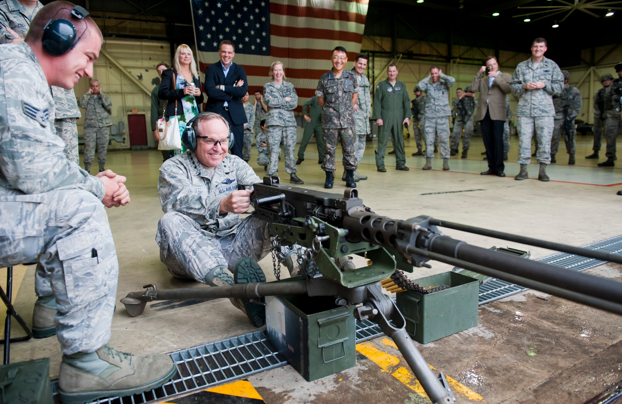KUNSAN AIR BASE, Republic of Korea – Air Force Chief of Staff Gen. Mark A. Welsh III, fires an M2 Browning Machine Gun during a demonstration here Aug. 23, 2013. The Wolf Pack hosted Welsh and Chief Master Sgt. of the Air Force James A. Cody as part of their two-week tour of the Pacific theater, thanking Airmen and their families for their service and dedication. (U.S. Air Force photo by Senior Airman Armando A. Schwier-Morales/ Released)