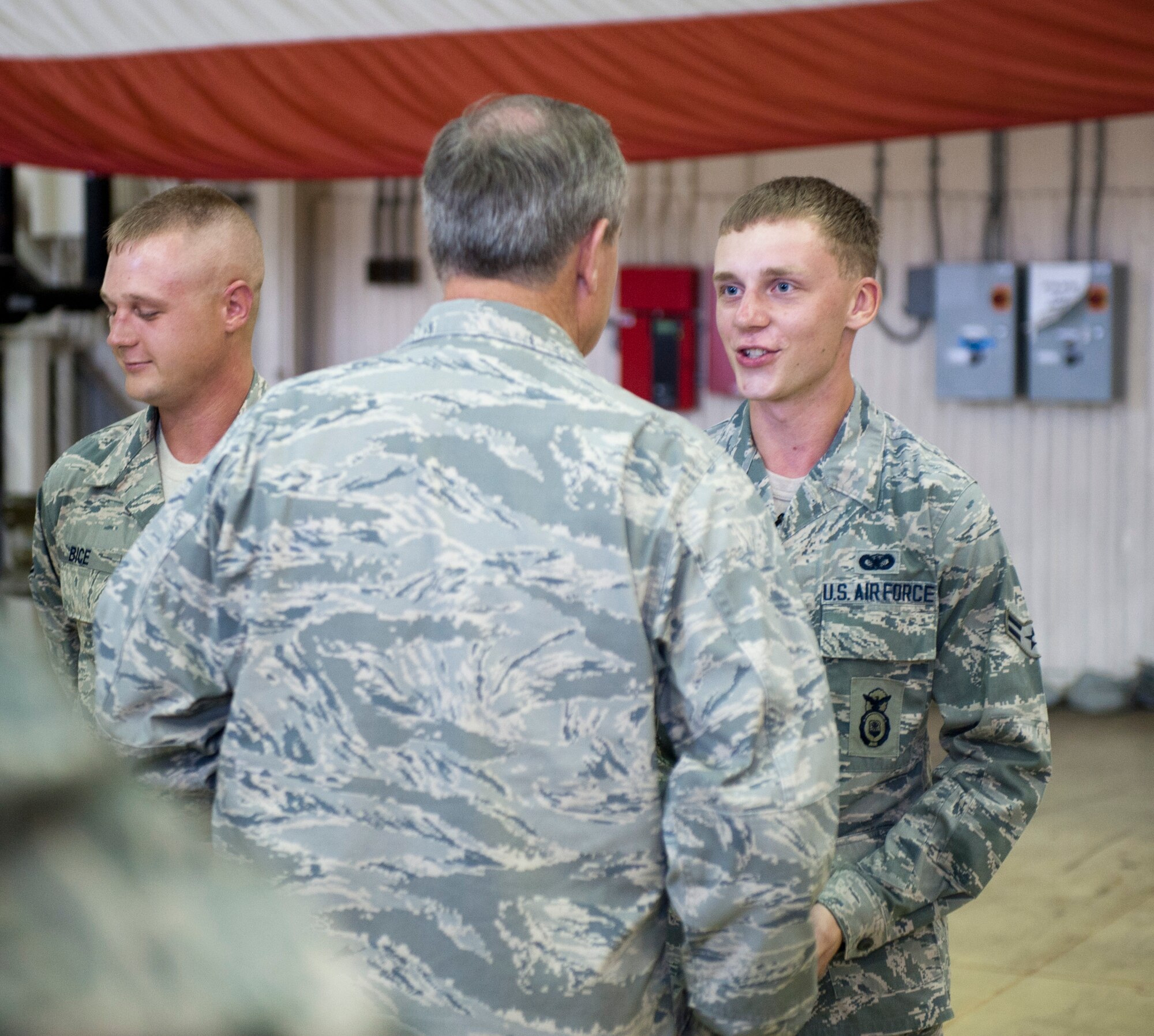 KUNSAN AIR BASE, Republic of Korea -- Airman 1st Class James Bugaj, 8th Security Forces, speaks with Air Force Chief of Staff Gen. Mark A. Welsh III, Aug. 24, 2013. Welsh and Chief Master Sgt. of the Air Force James A. Cody visited with the Wolf Pack to thank Airmen for their support and dedication and to discuss the challenges and opportunities in the region. (U.S. Air Force photo by Senior Airman Armando A. Schwier-Morales/ Released)