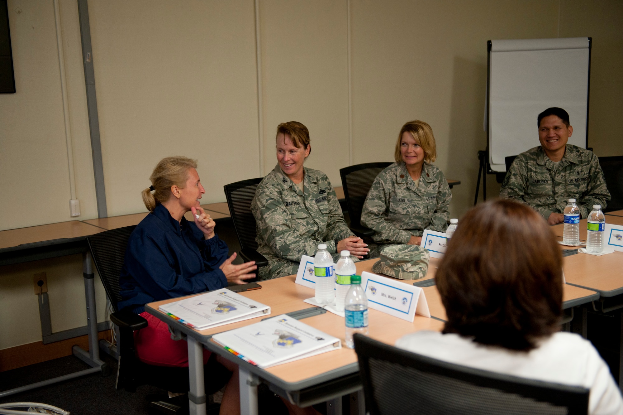 KUNSAN AIR BASE, Republic of Korea -- Athena Cody, wife of Chief Master Sgt. of the Air Force James A. Cody, speaks to the 8th Mission Support Group leadership about Airmen and family care Aug. 23, 2013. Mrs. Cody and Betty Welsh, wife of Air Force Chief of Staff Gen. Mark A. Welsh III, met with the Airman and Family Readiness Center staff to discuss opportunities and challenges regarding family care during an unaccompanied tour. (U.S. Air Force photo by Senior Airman Clayton Lenhardt/Released)