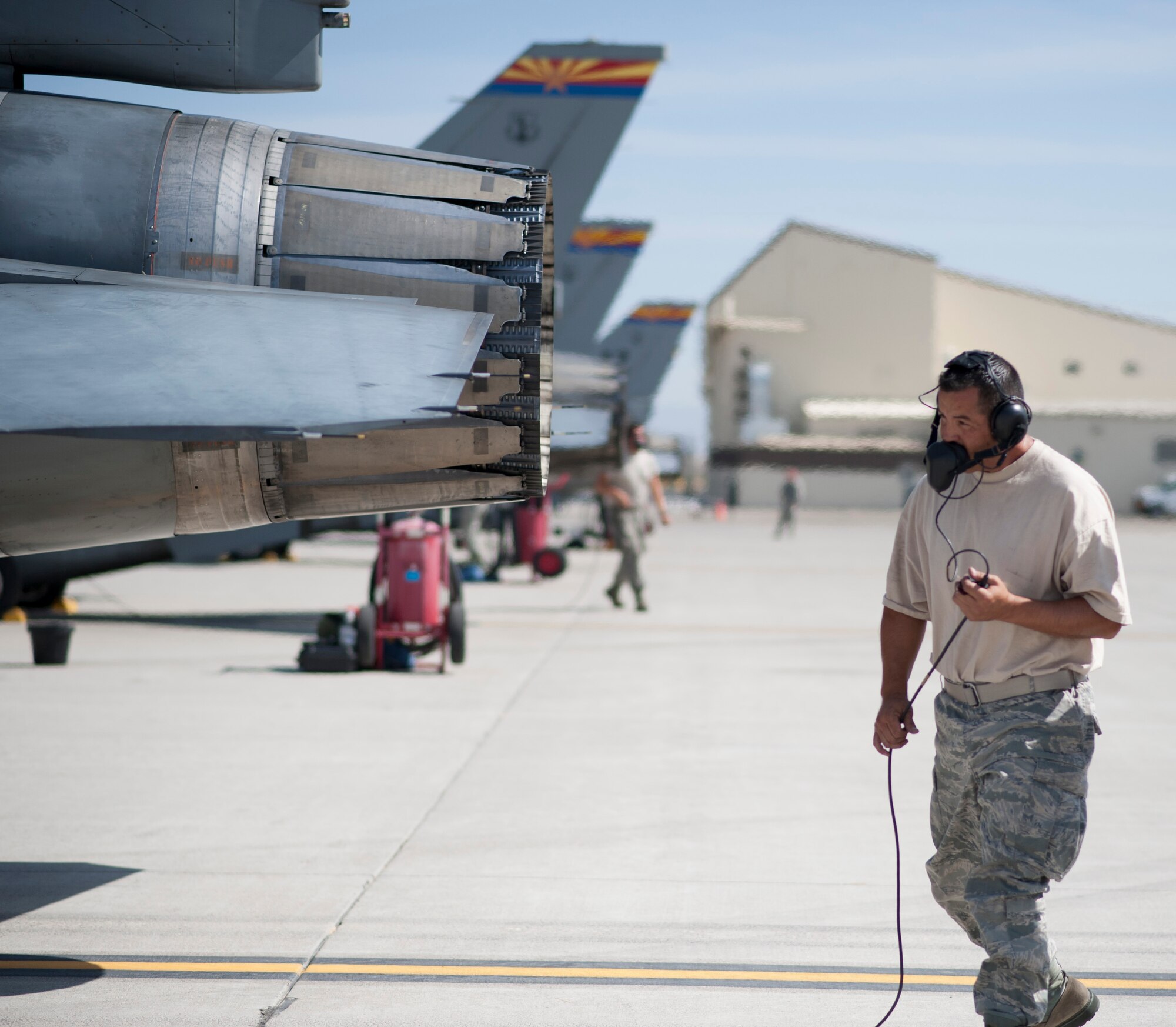 Staff Sgt. William Garcia, 152nd Fighter Squadron crew chief performs pre-flight checks and inspections Aug. 22, 2013, at Mountain Home Air Force Base, Idaho. More than 30 Arizona Air National Guardsman are currently on temporary duty here conducting training. (U.S. Air Force photo by Airman 1st Class Malissa Lott/Released)