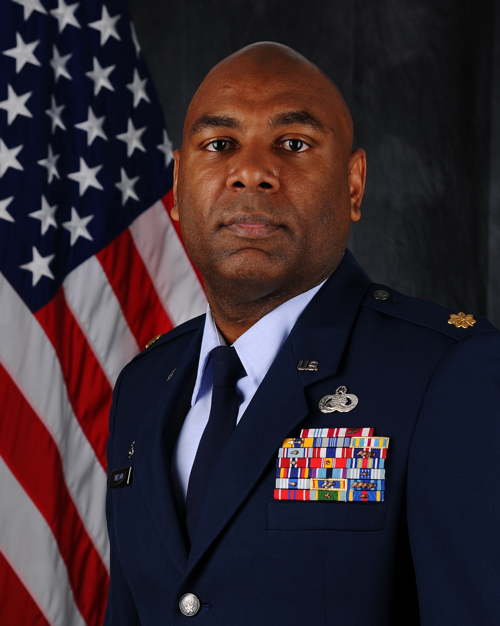 130826-F-GZ967-001 Official U.S. Air Force file photo, Maj. Dexter Nelson, 90th Force Support Squadron commander. 