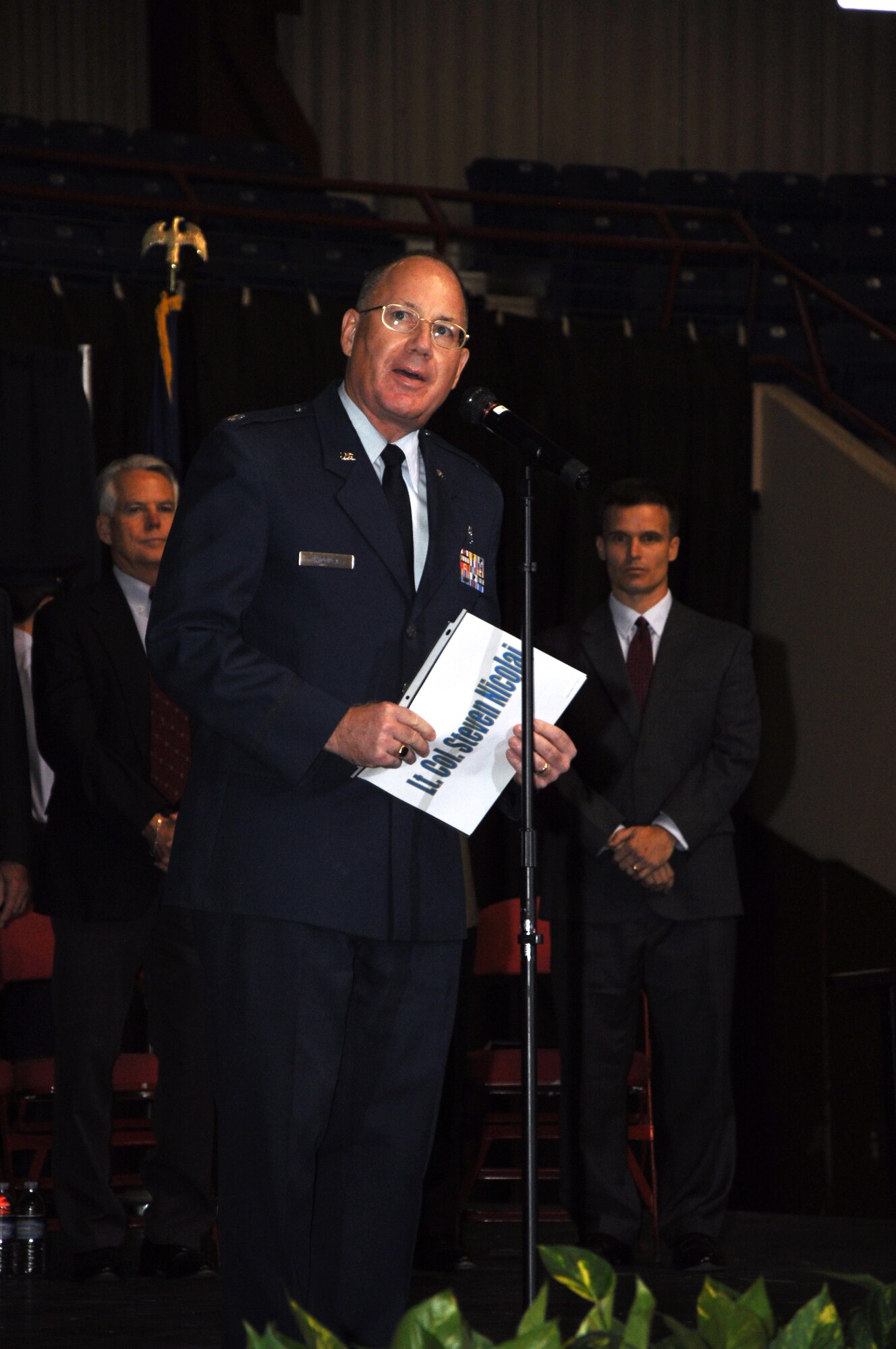 SAN ANGELO, Texas – Lt. Col. Steven Nicolai, 17th Training Wing chaplain, opens the San Angelo Independent School District convocation with a prayer at the Foster Communications Coliseum Aug. 22. Nicolai spoke of how thankful he is that everyone could get together to better the education of the children in the SAISD area. (U.S. Air Force photo/ Airman 1st Class Joshua Edwards)