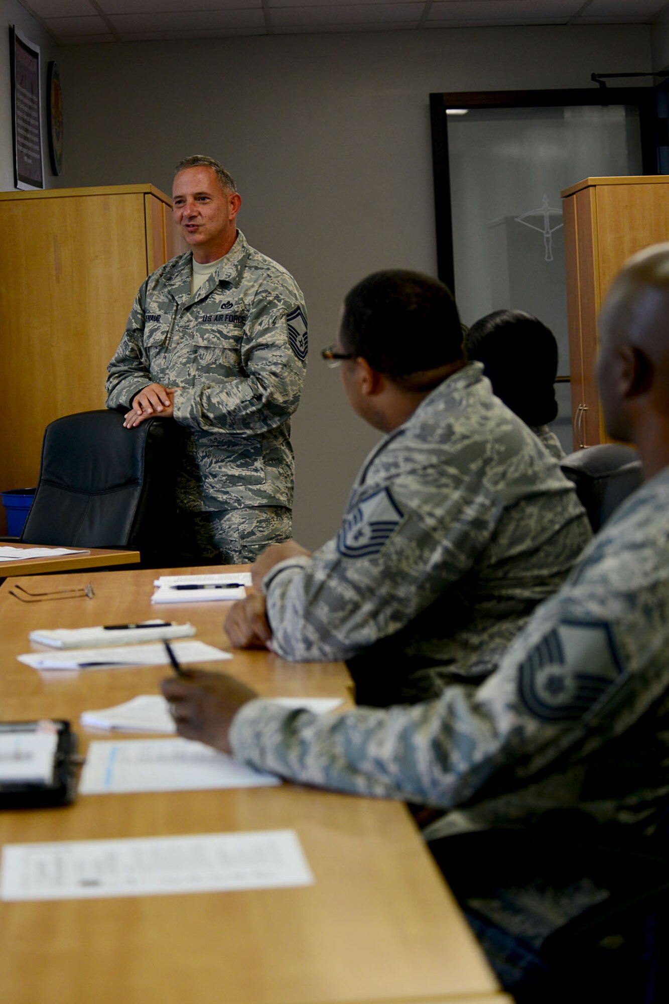 U.S. Air Force Senior Master Sgt. Randall Renaud, 633rd Civil Engineer Squadron engineering flight superintendent, speaks with senior noncommissioned officers during the Winning with People course at Langley Air Force Base, Va., Aug. 21, 2013. Renaud received an Article 15 after being arrested for driving under the influence in 2002. (U.S. Air Force photo by Staff Sgt. Ashley Hawkins/Released)