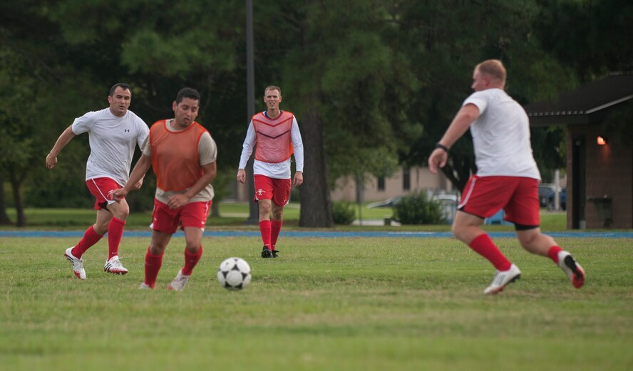 Flying Tigers Football Club players scrimmage during soccer practice at Moody Air Force Base, Ga. Aug. 22, 2013, as they prepare for the Defender’s Cup soccer tournament.  It will be the first time Moody AFB is represented at the all-military international competition. (U.S. Air Force photo by Airman 1st Class Sandra Marrero/Released)
