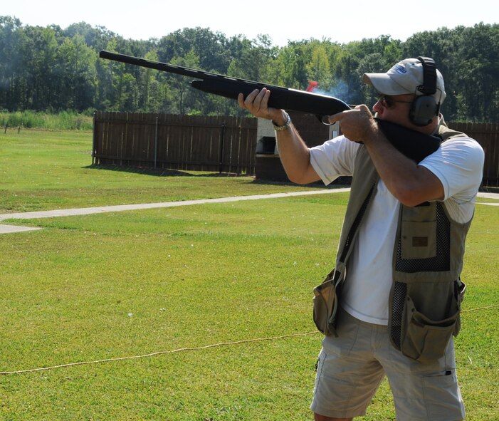 Scott Vincent, 2nd Civil Engineer Squadron deputy commander, fires his shotgun at Red Chute Shotgun Sports Club on Barksdale Air Force Base, La., Aug. 24, 2013. The club offers trap and skeet shooting, and a five-stand sporting clay range to all Department of Defense card holders and approved civilians. (U.S. Air Force photo/Senior Airman Sean Martin)