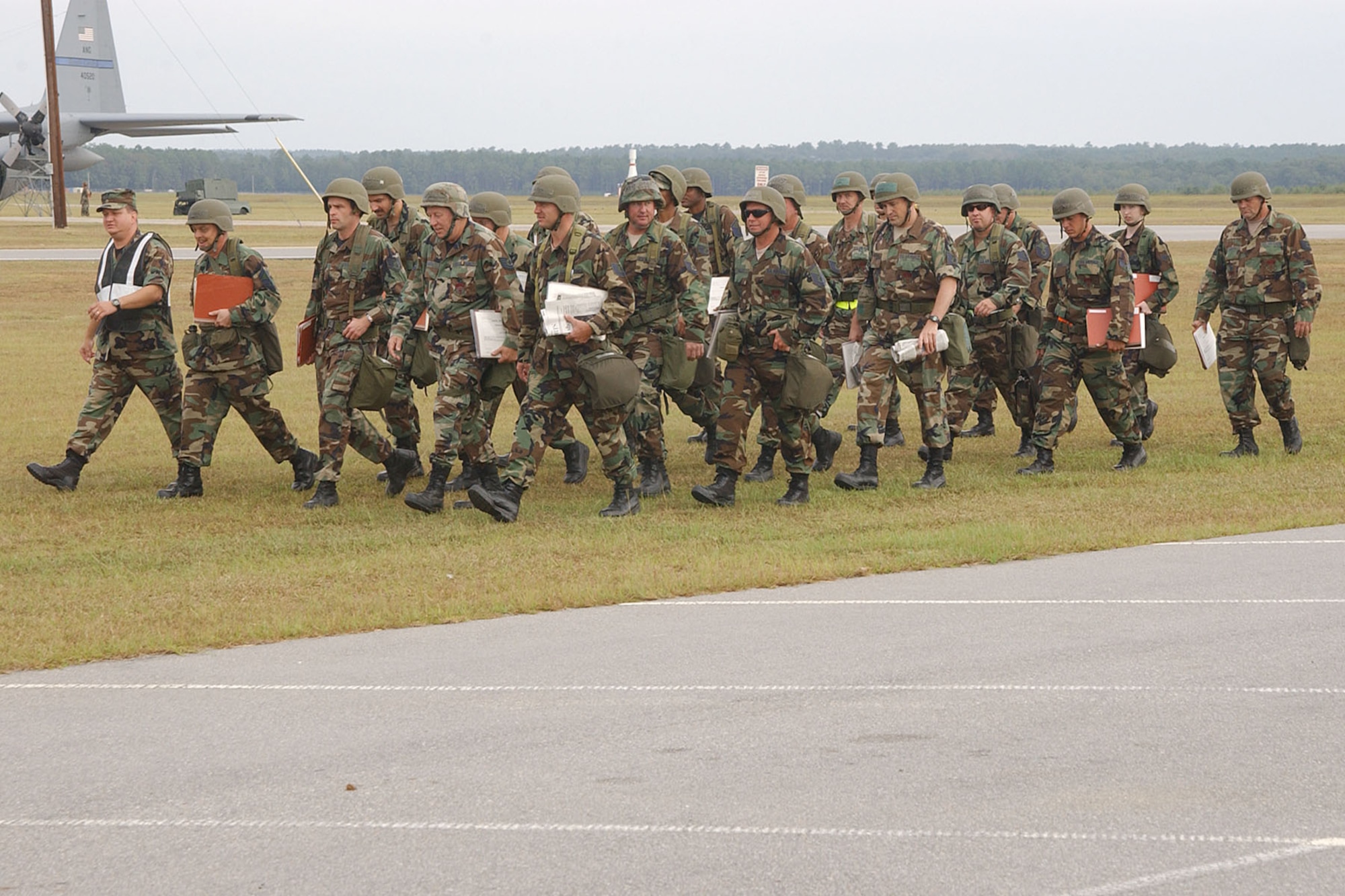Members of the South Carolina Air National Guard at McEntire Joint National Guard Base, simulate outprocessing for deployment druing an Opperational Readiness Exercise, October 1, 2005. 
(U.S. Air National Guard photo by Senior Airman Caycee Watson/Released)