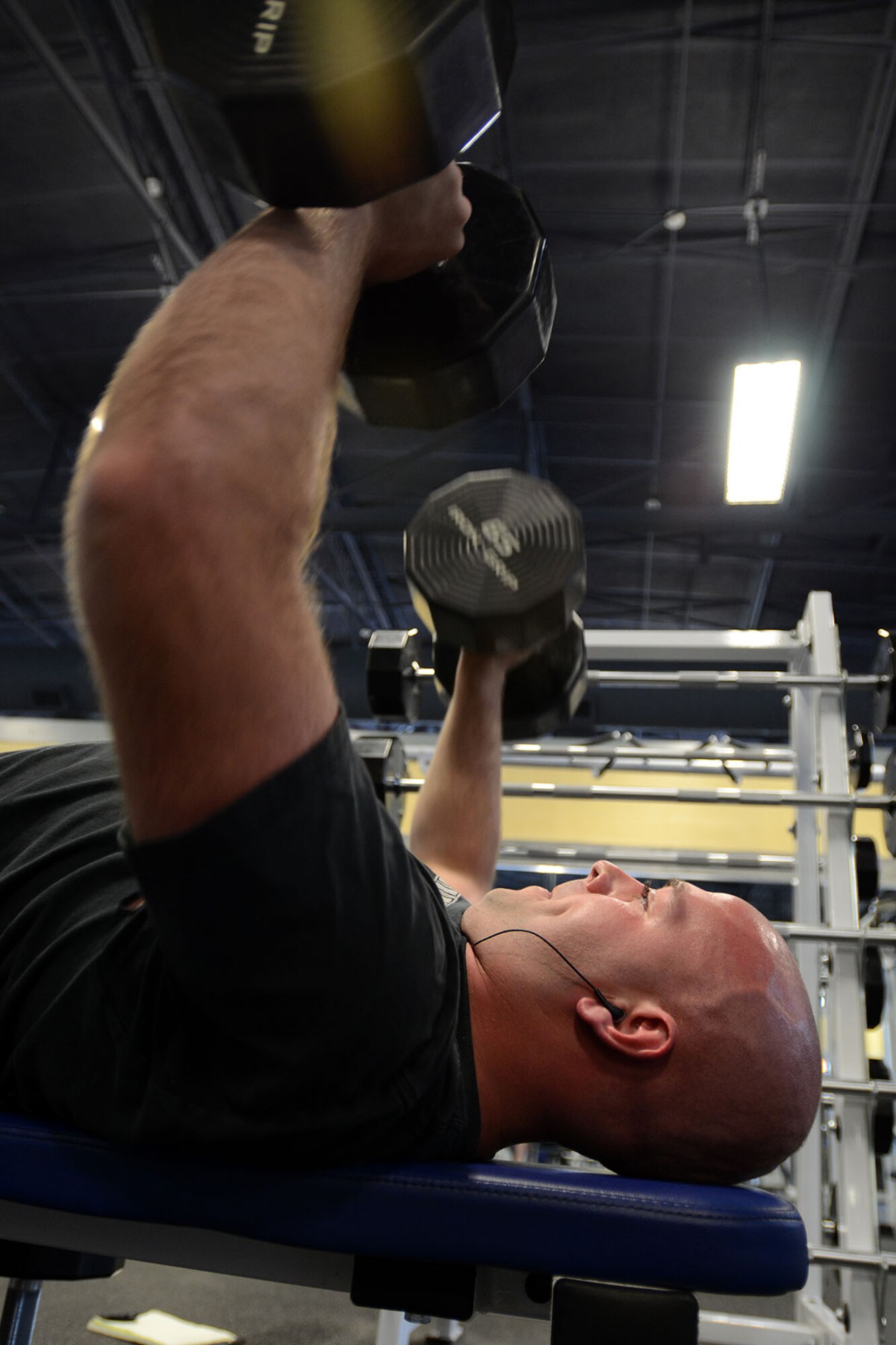 U.S. Air Force Airman 1st Class Timothy Lehman, with the 245th Air Traffic Control Squadron, South Carolina Air National Guard at McEntire Joint National Guard Base, S.C., maintains his physical fitness during a workout in the base gym May 28, 2013.  (U.S. Air National Guard photo by Tech. Sgt. Caycee Watson/Released)