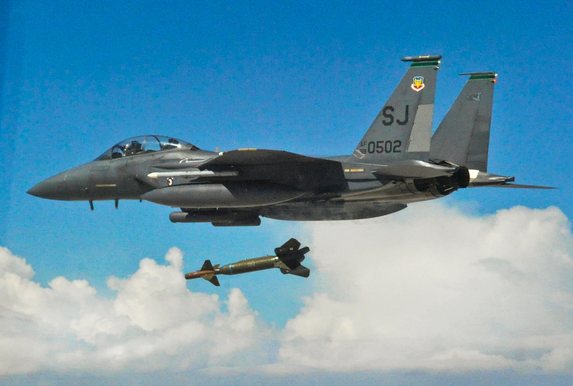 An F-15E Strike Eagle from the 335th Fighter Squadron from Seymour Johnson Air Force Base, N.C., releases a guided bomb unit during a Weapons System Evaluation Program mission at Hill Air Force Base, Utah. The sortie was part of three weeks of evaluation at Hill by the 53rd Weapons Evaluation Group. The WSEP program is used to evaluate the effectiveness and suitability of combat air force weapon systems. The evaluations are accomplished during tactical deliveries of fighter, bomber and unmanned aerial system precision guided munitions, on realistic targets with air-to-air and surface-to-air defenses. For many of the aircrew participating in WSEP, it is the first time employing live weapons. This provides a level of combat experience many units face during combat. (Courtesy photo.)