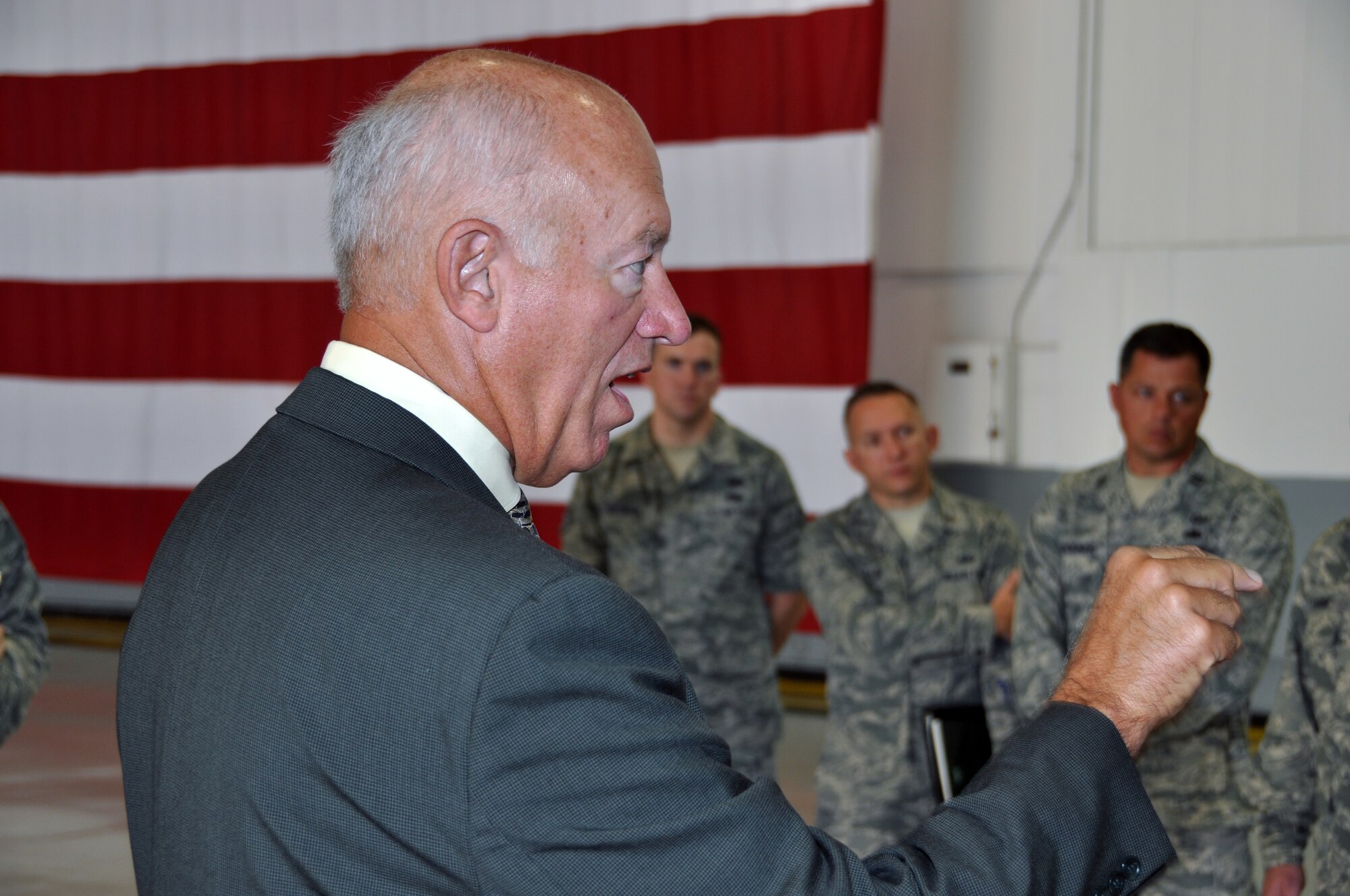 Former Oklahoma Adjutant General, retired Air Force Lt. Gen. General Harry (Bud) M. Wyatt addresses reservists and guardsmen here as part of the National Commission on the Structure of the Air Force site visit.  Wyatt along with retired Marine Corps Lt. Gen. Dennis M. McCarthy, retired Air Force Gen. Raymond E. Johns Jr., and Dr. Janine A. Davidson visited Tinker Air Force Base to get input and perspectives from Airmen in the field on how best to shape the future force. (U.S. Air Force photo/Senior Airman Mark Hybers)