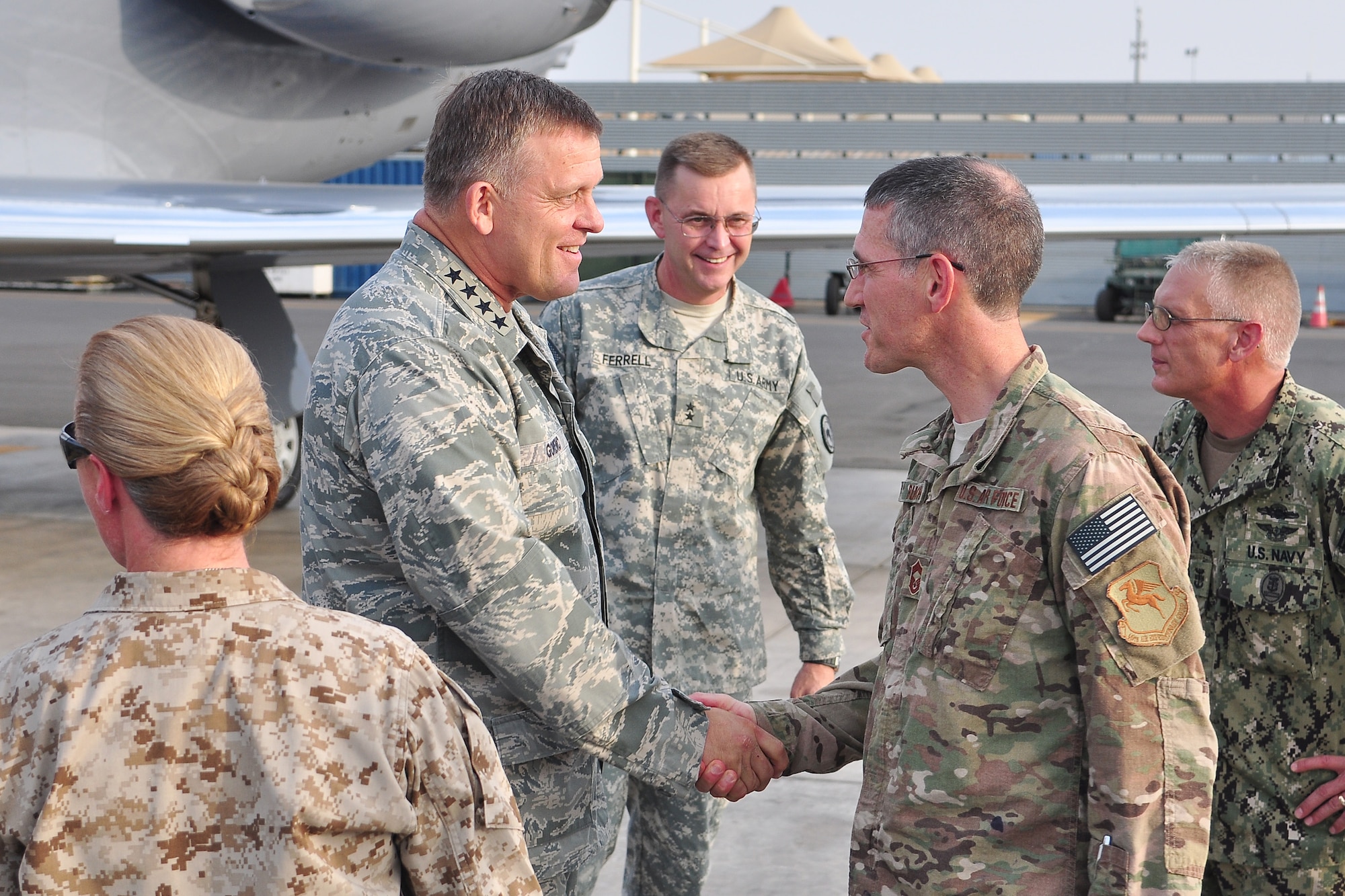 U.S. Air Force Gen. Frank Gorenc, U.S. Air Forces in Europe and Air Forces Africa commander, meets U.S. Air Force Chief Master Sgt. Duane Buchi, 449th Air Expeditionary Group senior enlisted leader, as he gets off a plane at Camp Lemonnier, Djibouti, Aug. 22, 2013. This was Gorenc ‘s first trip to Africa since taking command of USAFE/AFAFRICA and he used the trip to familiarize himself with Combined Joint Task Force-Horn of Africa’s mission of stabilizing and strengthening security in East Africa through military-to-military engagements with partner nations. (U.S. Air Force photo by Tech. Sgt. Chad Thompson)