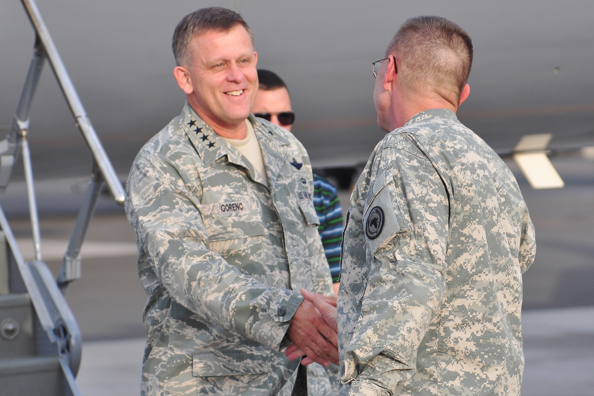 U.S. Air Force Gen. U.S. Air Force Gen. Frank Gorenc, U.S. Air Forces in Europe and Air Forces Africa commander, meets U.S. Army Maj. Gen. Terry Ferrell, commanding general of Combined Joint Task Force-Horn of Africa, as he gets off a plane at Camp Lemonnier, Djibouti, Aug. 22, 2013. This was Gorenc ‘s first trip to Africa since taking command of USAFE/AFAFRICA and he used the trip to familiarize himself with CJTF-HOA’s mission of stabilizing and strengthening security in East Africa through military-to-military engagements with partner nations. (U.S. Air Force photo by Tech. Sgt. Chad Thompson)