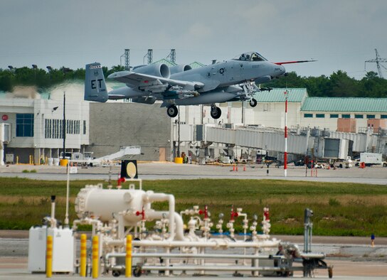 An A-10C Thunderbolt II from the 40th Flight Test Squadron, returns to Eglin Air Force Base, Fla., after a test mission.  The aircraft is loaded up with weaponry to test the combat carriage limits of the Sargent Fletcher external fuel tank.  The A-10 flight personnel are testing to ensure the A-10 can carry the tank into a combat environment safely.  If proven to be safe to carry, the tank will add up to 60 minutes of flighttime to its combat sortie.  (U.S. Air Force photo/Samuel King Jr.)