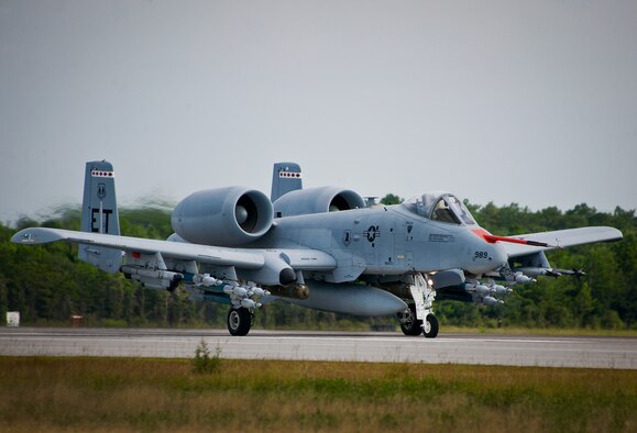 An A-10C Thunderbolt II from the 40th Flight Test Squadron, moves down the runway at Eglin Air Force Base, Fla.  The aircraft is loaded up with weaponry to test the combat carriage limits of the Sargent Fletcher external fuel tank.  The A-10 flight personnel are testing to ensure the A-10 can carry the tank into a combat environment safely.  If proven to be safe to carry, the tank will add up to 60 minutes of flighttime to its combat sortie.  (U.S. Air Force photo/Samuel King Jr.)
