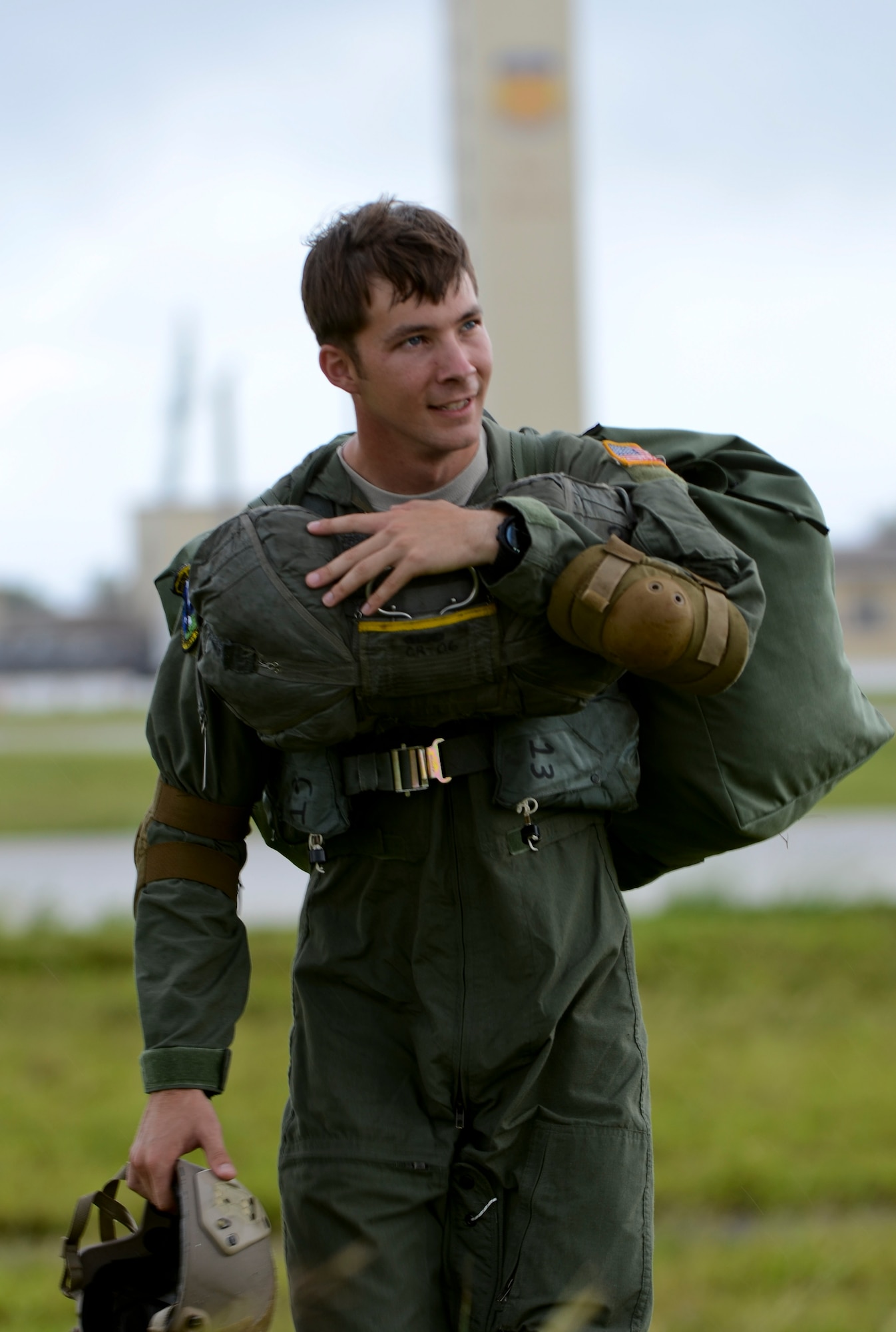 Staff Sgt. Jacob Thompson, 736th Security Forces Squadron fire team leader and jumpmaster, makes his way to the pick-up location after completing static line training Aug. 21, 2013, on the Andersen Air Force Base, Guam, flightline. Air Force static line capability falls under the personnel parachute program. Jumpers are first qualified during a three-week long basic airborne course at Ft. Benning, Ga., and then continue to work on their jumping proficiency and qualifications after they return here. (U.S. Air Force photo by Airman 1st Class Marianique Santos/Released)