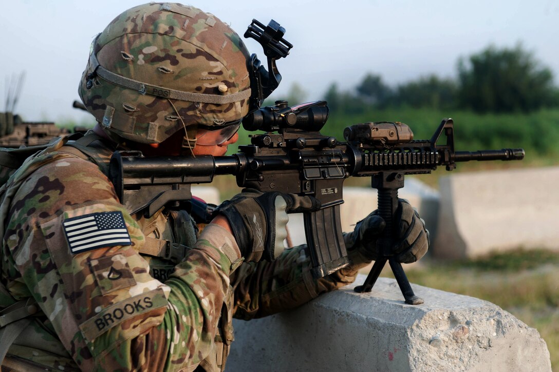 U.S. Army Pfc. Arturo Brooks provides security during a presence patrol around Forward Operating Base Fenty in Nangarhar province, Afghanistan, Aug. 22, 2013. Brooks is assigned to the 1st Cavalry Division's 4th Squadron, 9th Cavalry Regiment, 2nd Armored Brigade Combat Team.