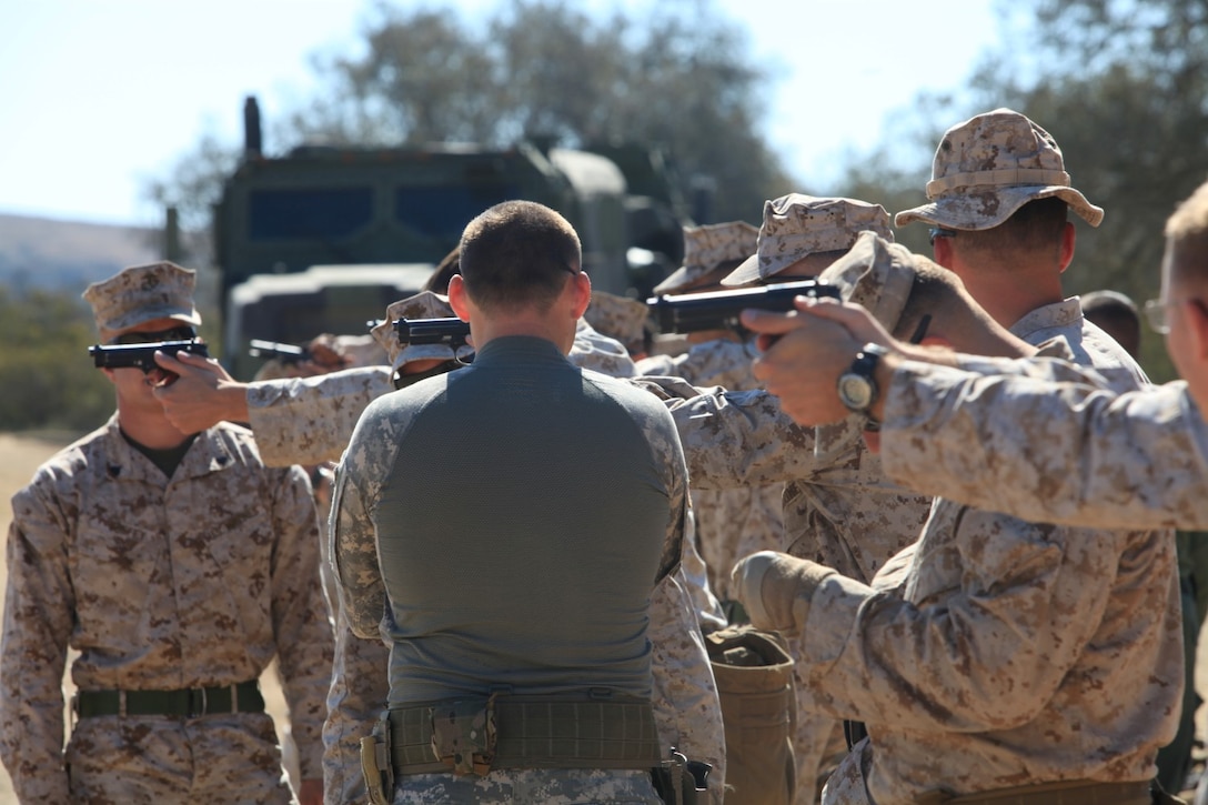 Marines with 1st Law Enforcement Battalion train to acquire a military occupational specialty of special reaction team member aboard Camp Pendleton, Calif. The training is a two-week course during August that military police can volunteer for or be selected to attend the follow-on training.