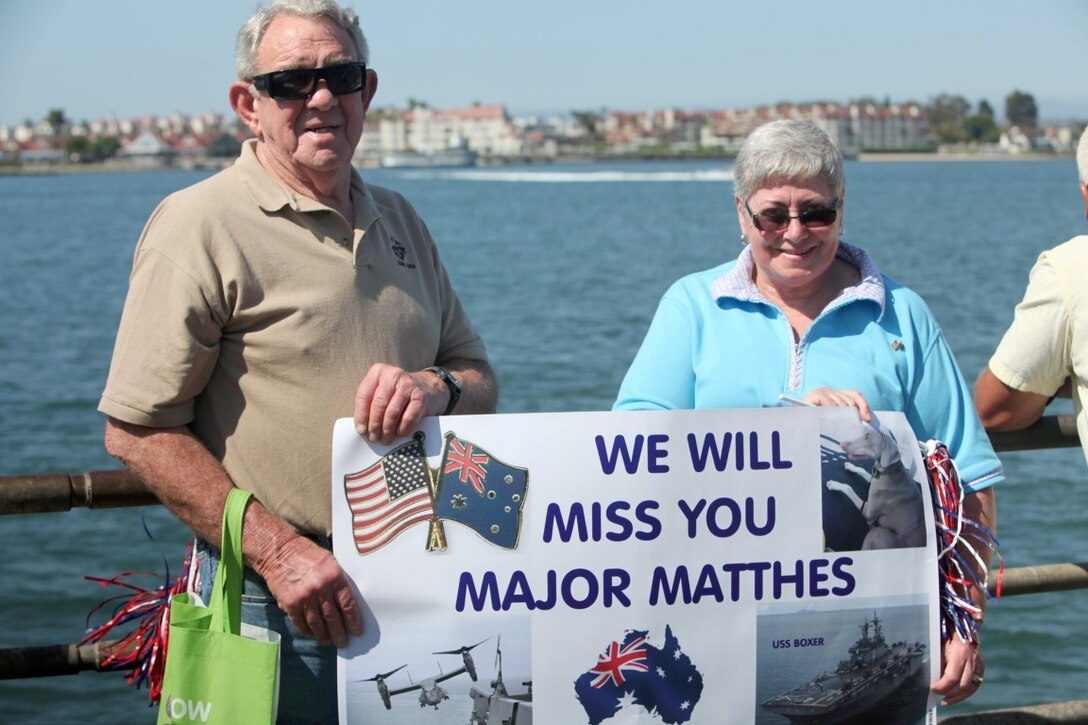 Denis and Alex Matthes await the departure of the 13th Marine Expeditionary Unit out of Naval Base San Diego, Aug. 23. The Mattheses traveled all the way from Australia to see their daughter, Maj. Rachel Matthes, who is currently assigned to the 13th MEU. More than 2,400 Marines and sailors with the 13th MEU departed for deployment with the Boxer Amphibious Ready Group.