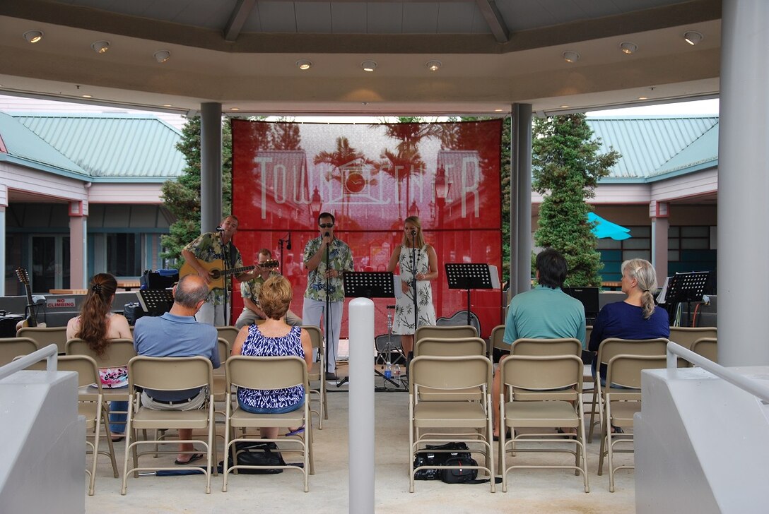 MILILANI, Hawaii -- Small Kine, Band of the Pacific-Hawaii, performs at the Mililani Concert Series in Mililani,Hawaii, Aug. 10, 2013. The Band of the Pacific-Hawaii participated in three summer concerts in Mililani. The concert series helped build stronger community relations with the town, and the hundreds of people who attended the concerts.

(US Air Force Photo/Ms. Nicolle Euredjian/ released)