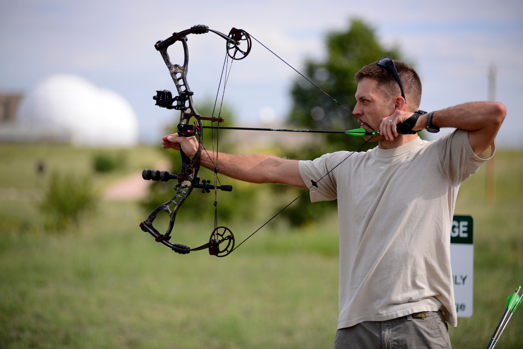 Tim Paget takes aim during the inaugural Schriever Archery Competition here Aug. 23.  Paget beat out 11 other competitors to take first place after two rounds of sharp shooting. (U.S. Air Force photo/Christopher DeWitt)