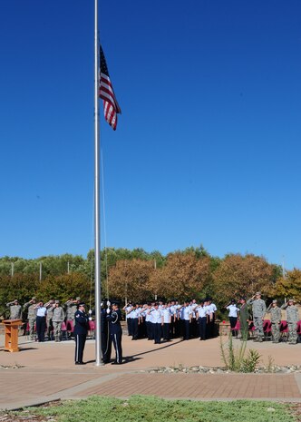 An all-female honor guard team lowers the flag during a retreat ceremony honoring Women’s Equality Day at Beale Air Force Base, Calif., Aug. 26, 2013. The world’s first women’s rights convention formally began in Seneca Falls, N.Y. in 1848. (U.S. Air Force photo by Senior Airman Allen Pollard/Released)