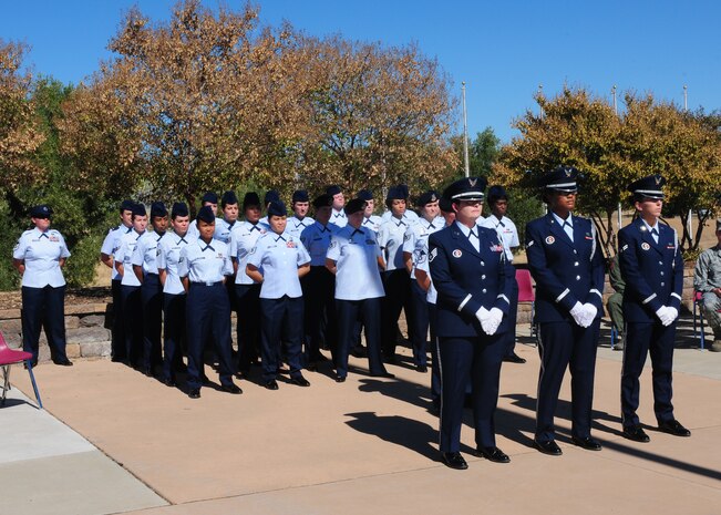 An all-female flight and honor guard team stand in formation for a retreat ceremony honoring Women’s Equality Day at Beale Air Force Base, Calif., Aug. 26, 2013. In 1971, Representative Bella Abzug introduced a bill designating August 26th of each year as Women’s Equality Day, and the bill passed.  Part of the bill reads that Women’s Equality Day is a symbol of women’s continued fight for equal rights and that the United States commends and supports them. (U.S. Air Force photo by Senior Airman Allen Pollard/Released)