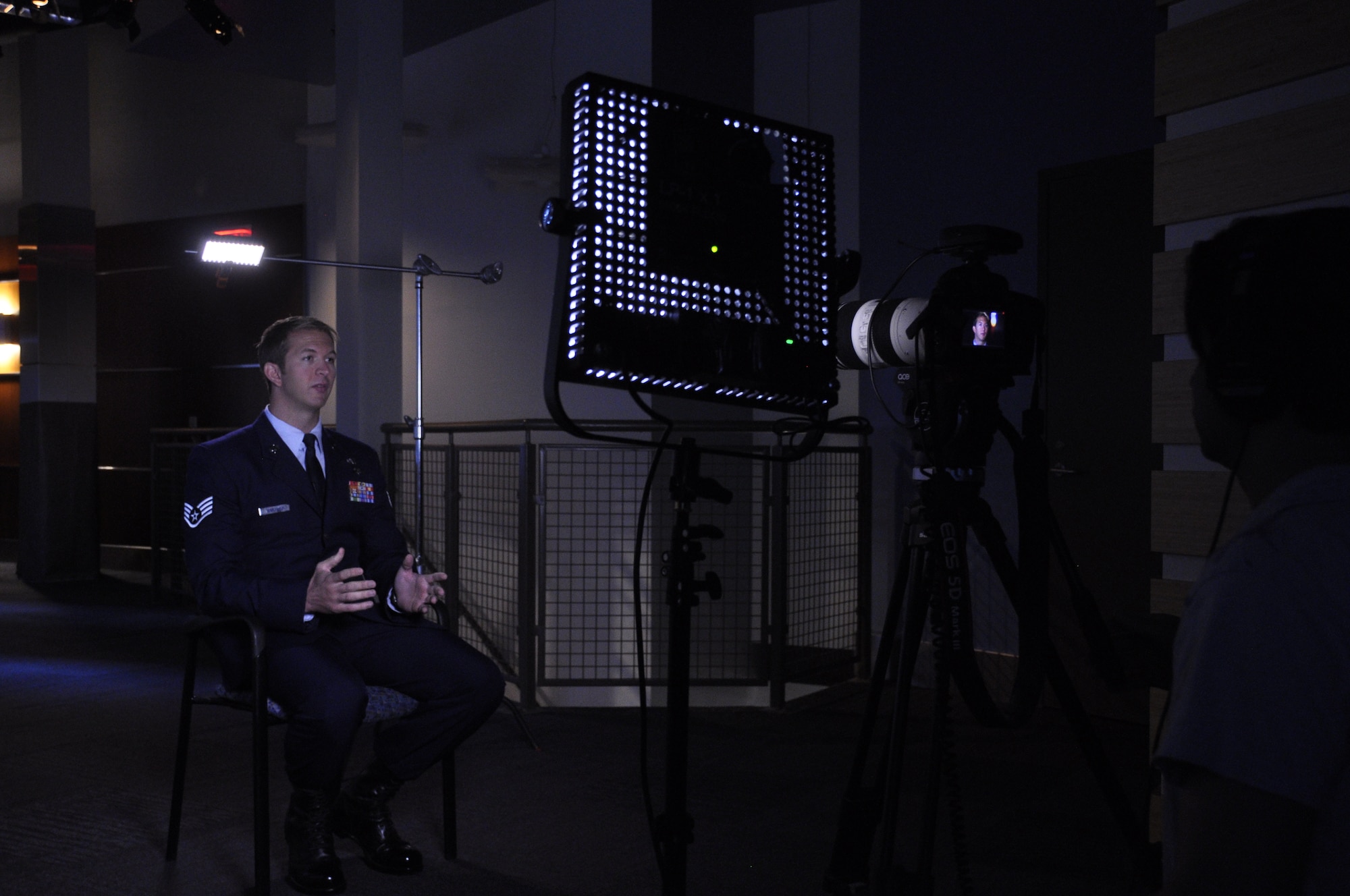 Staff Sgt. Travis Sanford, Special Tactics Training Squadron instructor, conducts an interview for The Weather Channel's website Aug. 23, 2013 in Atlanta, Ga. The interview highlighted the Special Operations Weather Team career field and the challenges of observing and forecasting weather downrange. (U.S. Air Force photo by Capt. Victoria Porto) 
