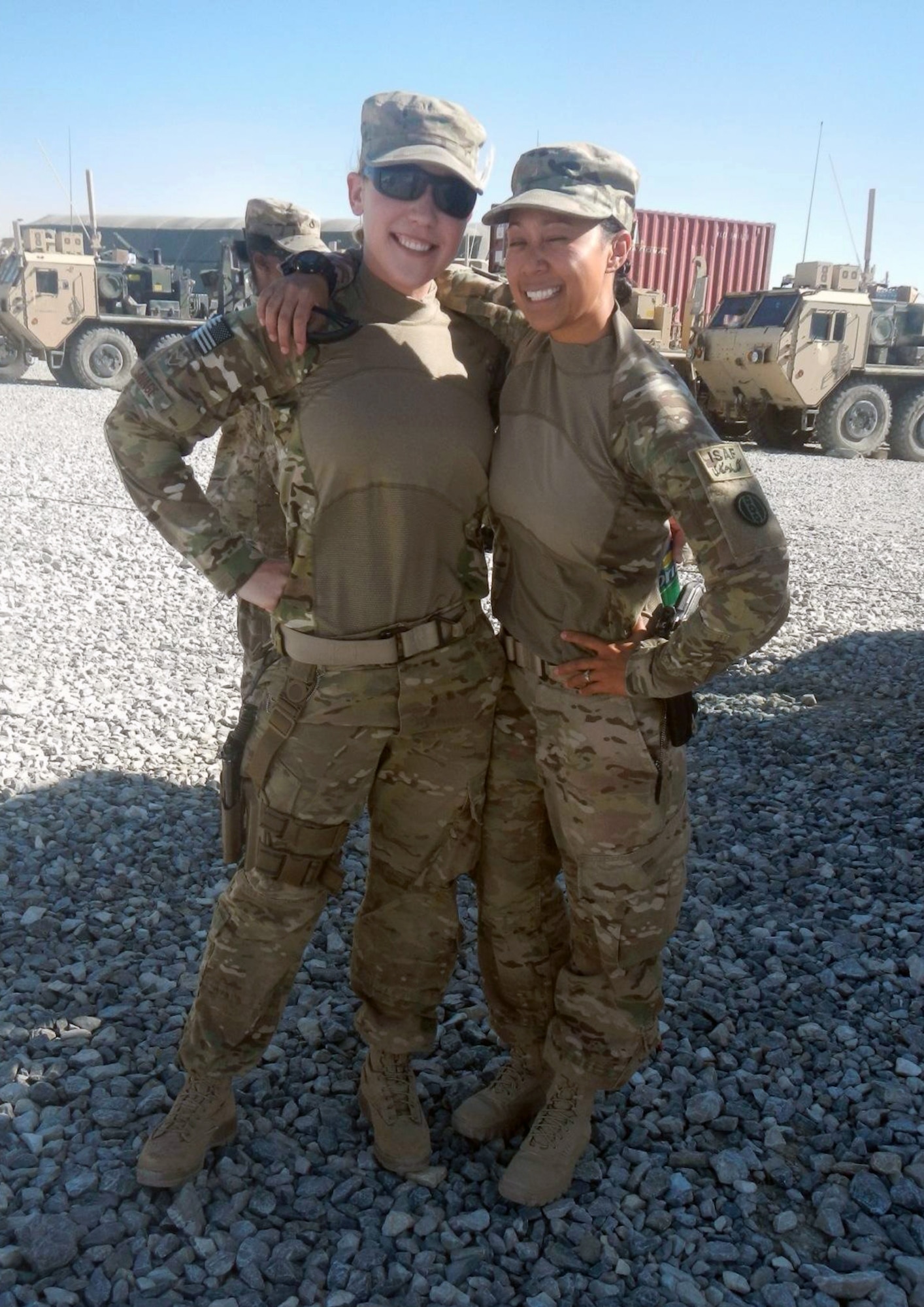 Air Force Senior Airman Taylor Savage (deployed from Charleston Air Force Base, S.C.) and Staff Sgt. Maria Szymanski (deployed from Mountain Home Air Force Base, Idaho) before a May 29-30, 2013 convoy from Bagram Airfield, Afghanistan, to forward operating bases and combat outposts in Wardak Province. The next day, during day two of the mission, the vehicle Savage was traveling in hit an improvised explosive device, killing Army Staff Sgt. Joe Nunez, and wounding several others, including Savage. (Courtesy photo)