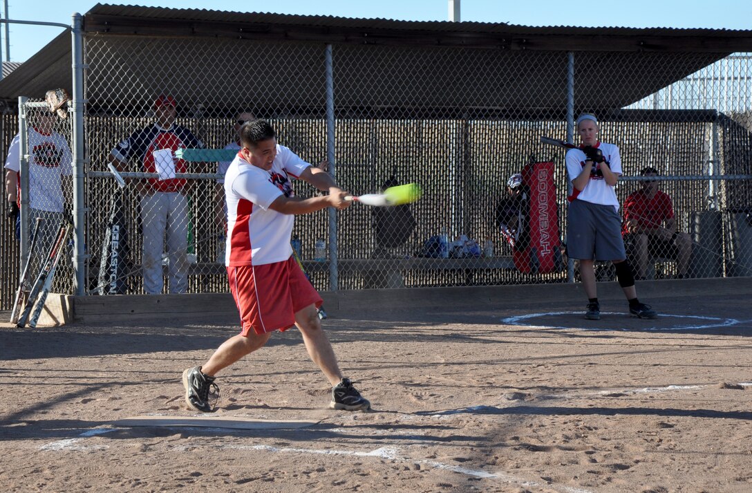 Staff Sgt. Gilbert Rincon, 9th Munitions Squadron, hits a softball during the 2013 Intramural Softball Championships at O’Malley Field on Beale Air Force Base, Calif., Aug. 26, 2013. 9th MUNS defeated 9th Civil Engineer Squadron, 26-9. (U.S. Air Force photo by Staff Sgt. Robert M. Trujillo/Released)