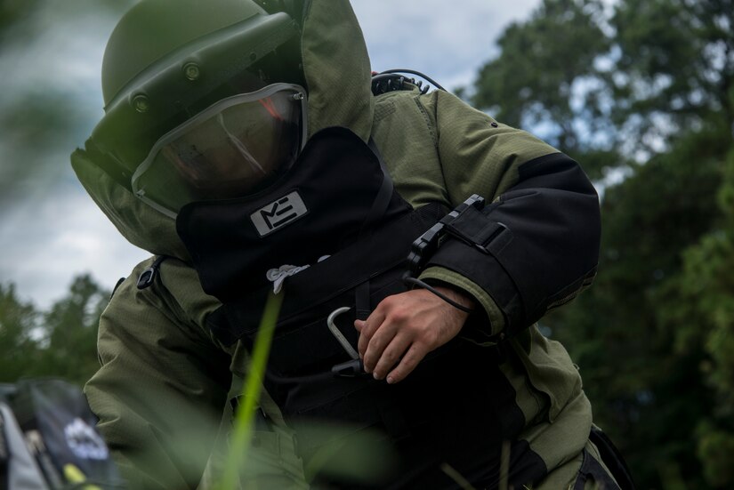 Staff Sgt. Aaron Clark, 628th Civil Engineer Squadron explosive ordnance disposal technician, preps the simulated suspect device to be x-rayed during an exercise Aug. 22, 2013 at Joint Base Charleston - Weapons Station, S.C. The scenario was one of many that tested JB Charleston to perform their duties under heightened security conditions during a routine security exercise (U.S. Air Force photo/Tech. Sgt. Rasheen Douglas)