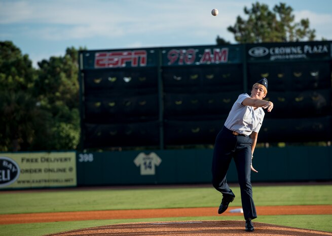 Col. Judith Hughes, 628th Medical Group commander, throws the first  pitch during the Charleston RiverDogs Military Appreciation Night game Aug. 21, 2013, at the Joseph P. Riley Jr. park in Charleston, S.C. The Charleston RiverDogs hosted Military Appreciation night to show their support for the local military. (U.S. Air Force photo/Tech. Sgt. Rasheen Douglas)
