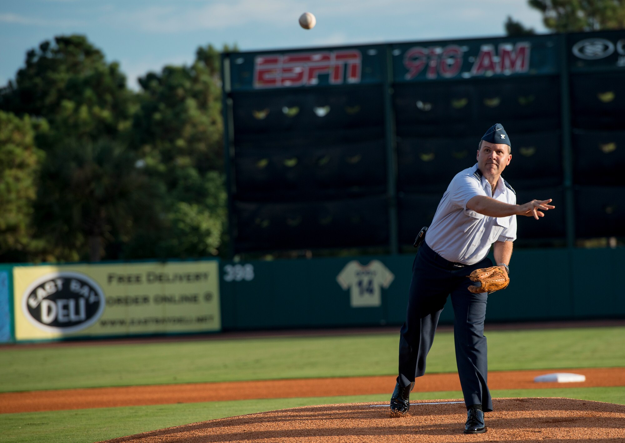 Col. Frederick Boehm, 437th Operations Group commander, throws the first pitch during the Charleston RiverDogs Military Appreciation Night game Aug. 21, 2013, at Joseph P. Riley Jr. park in Charleston, S.C. He was one of three commanders who threw the first pitch for the night. The Charleston RiverDogs hosted Military Appreciation night to show their support for the local military. (U.S. Air Force photo/Tech. Sgt. Rasheen Douglas)