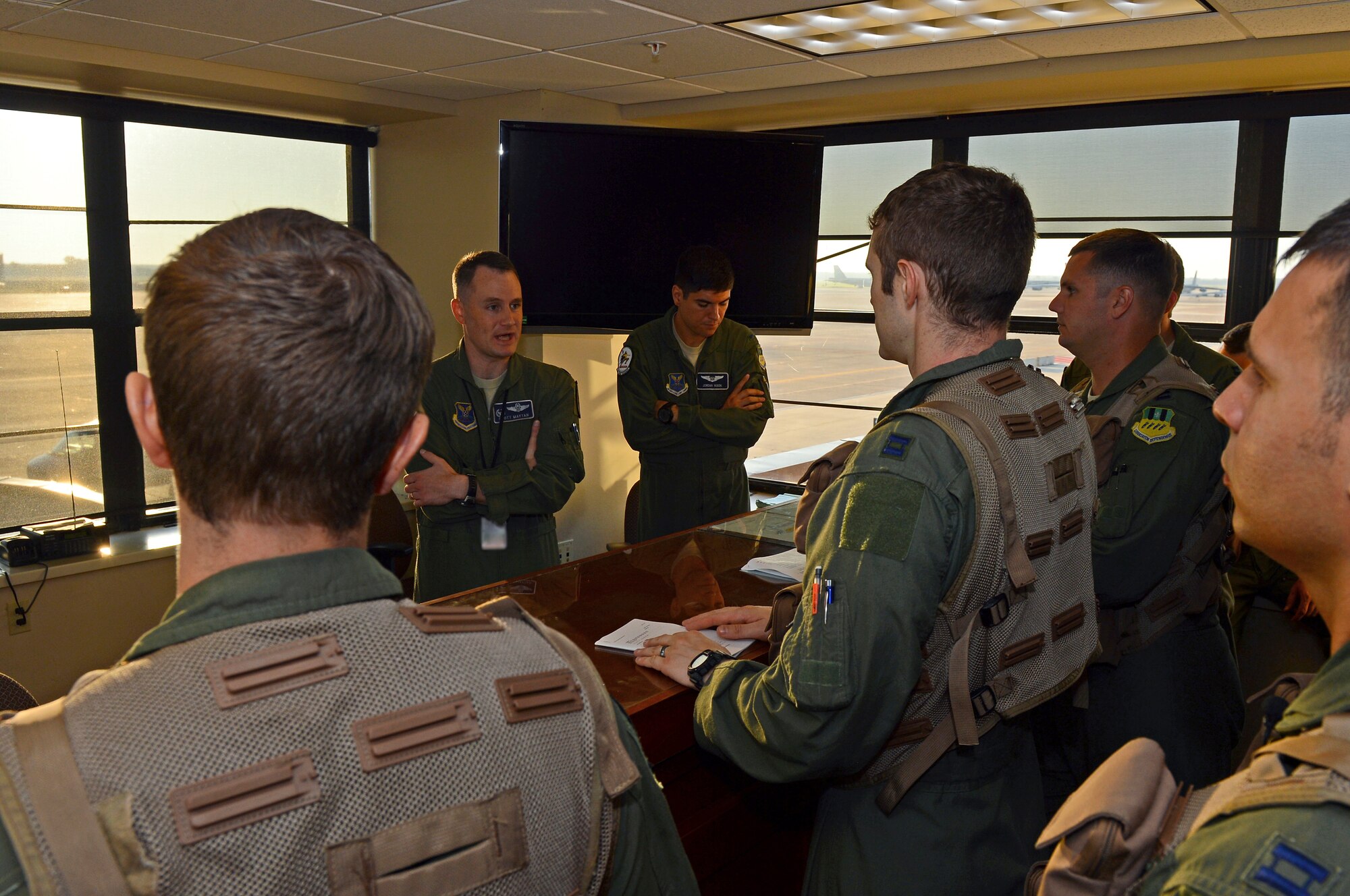 Lt. Col. Scott Maytan, 20th Bomb Squadron commander, addresses aircrew from the 20th BS during their predeparture brief on Barksdale Air Force Base, La., Aug. 26, 2013. Briefings are held before every flight to inform aircrew on weather conditions and other important information to ensure a safe flight. (U.S. Air Force photo/Senior Airman Micaiah Anthony)