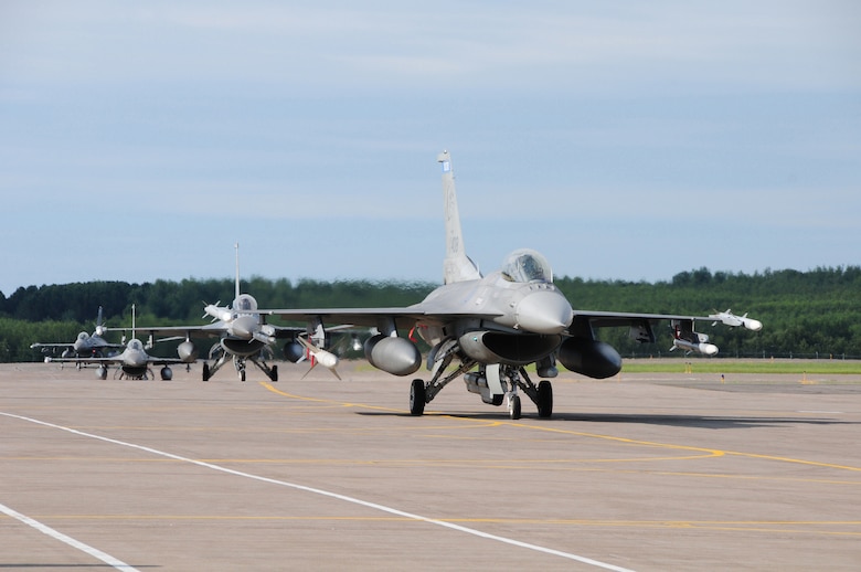 Block 50 F-16's from the 148th Fighter Wing, Duluth, Minn. return from a flying mission while participating in a Readiness Exercise on July 20, 2013.  The Air Combat Command (ACC) Inspector General team evaluated the 148FW during a Readiness Inspection (RI), Aug. 22-24, 2013, the wing received an overall grade of excellent.   (U.S. Air National Guard photo by Master Sgt. Ralph J. Kapustka/Released)