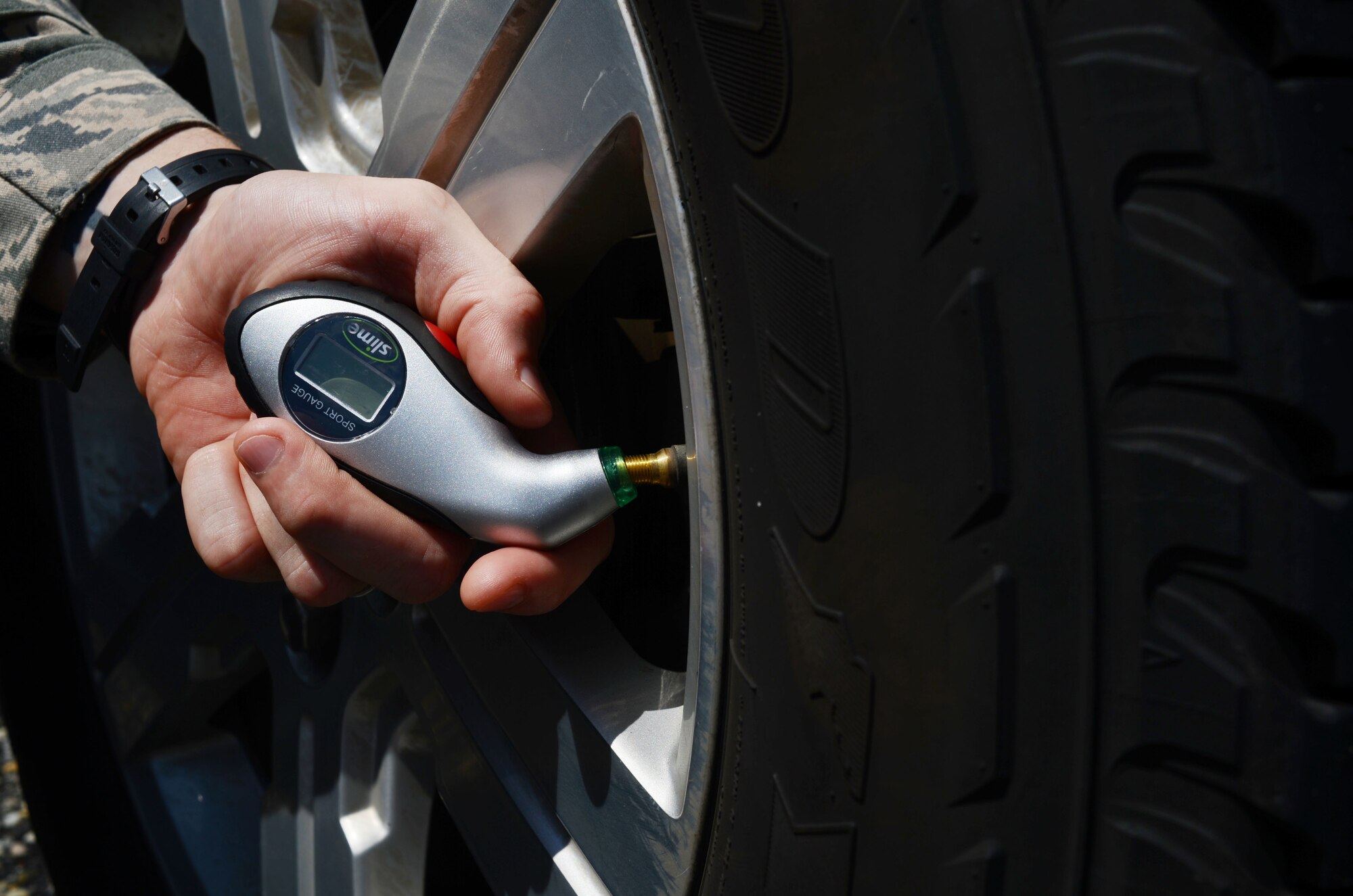 Before road trips, Shaw Air Force Base members should remember to check tire pressure and the condition of their tires to extend tire life, Shaw Air Force Base, S.C., Aug. 21, 2013. Labor Day weekend marks the traditional end of summer season and the critical days of summer. (U.S. Air Force photo by Senior Airman Tabatha Zarrella/Released)
