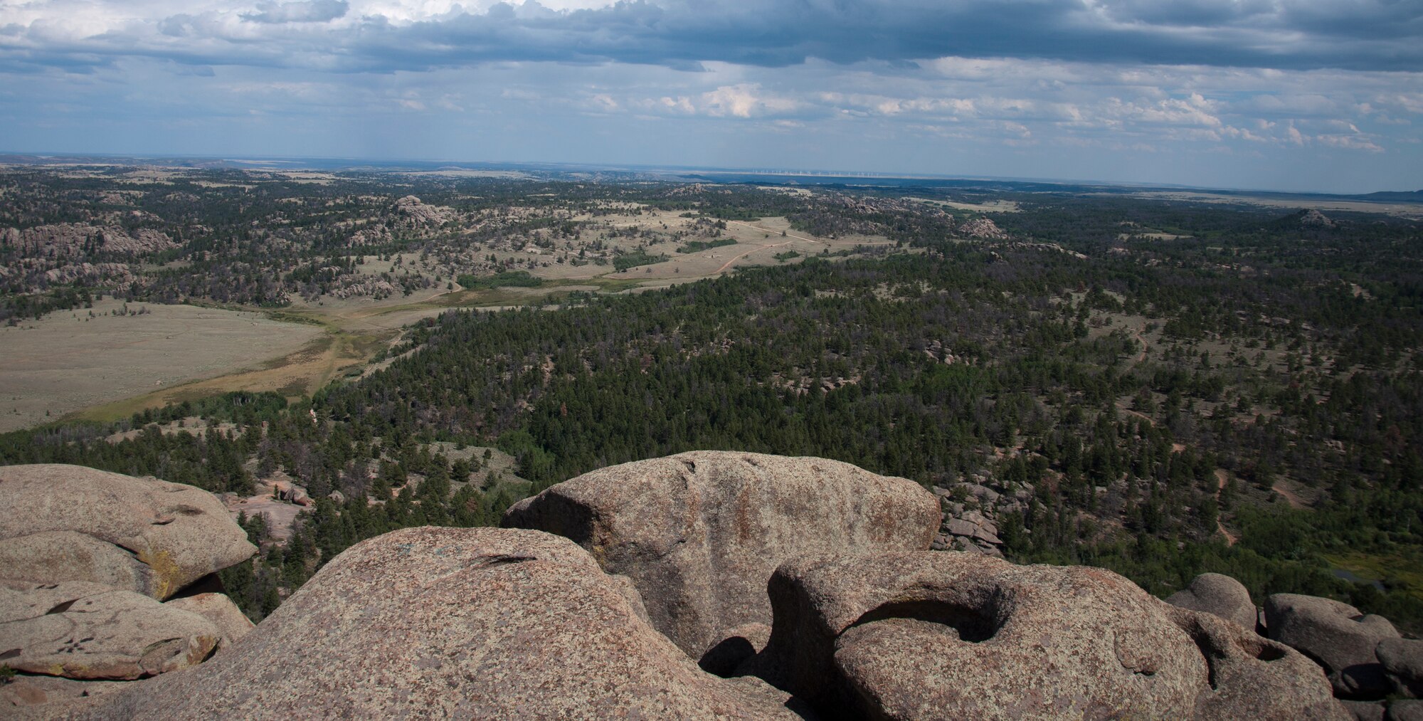 130824-F-GZ967-033 The top of the rocky hills of Vedauwoo, Wyo., offer a scenic view of the valley between Cheyenne and Laramie. Vedauwoo is located in Southern Wyoming north of Interstate 80. (U.S. Air Force photo by Airman 1st Class Brandon Valle)
