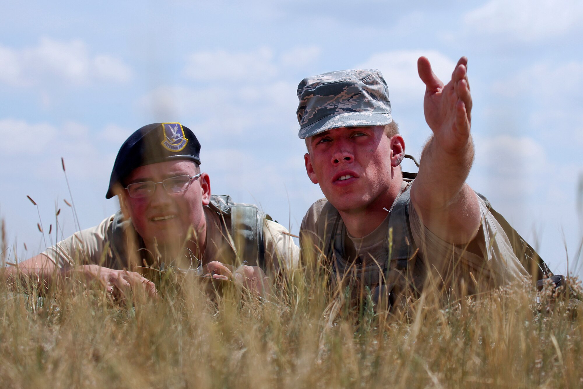 130822-F-JW079-0790
Airmen 1st Class Jarryd Sonnier and Anthony Saupe, 790th Missile Security Forces Squadron camper support, attempt to figure the distance to various objects, Aug. 22, 2013, in the range card event of the F.E. Warren Air Force Base, Wyo., Crow Creek Challenge. (U.S. Air Force photo by R.J. Oriez)
