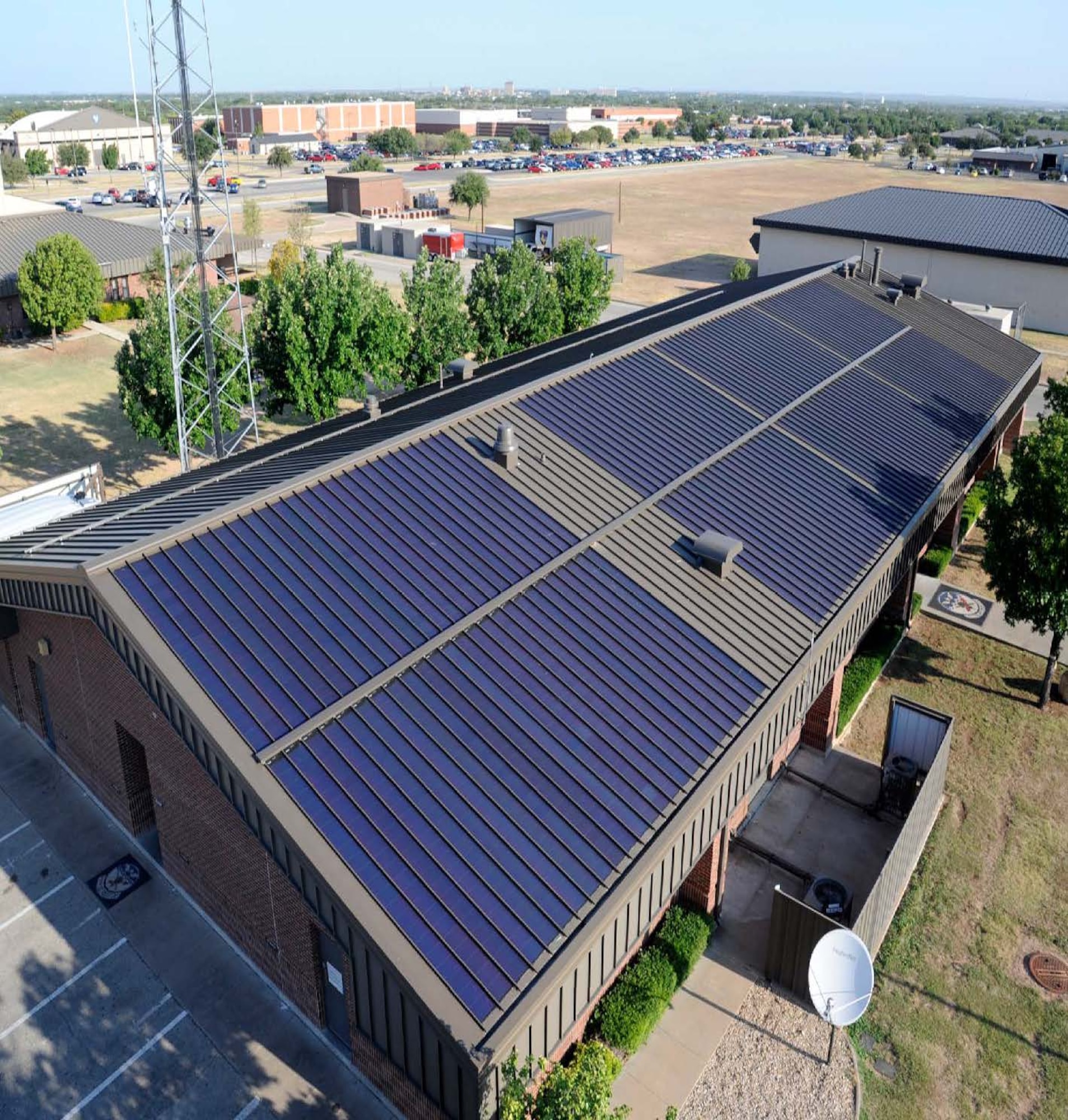 GOODFELLOW AIR FORCE BASE, Texas -- A one of its kind roof here is attracting national attention. Six sustainable technologies installed atop the base's security forces building reduces the utility bill, produces energy and captures rainwater for irrigation. (U.S. Air Force photo/Eddie Green)