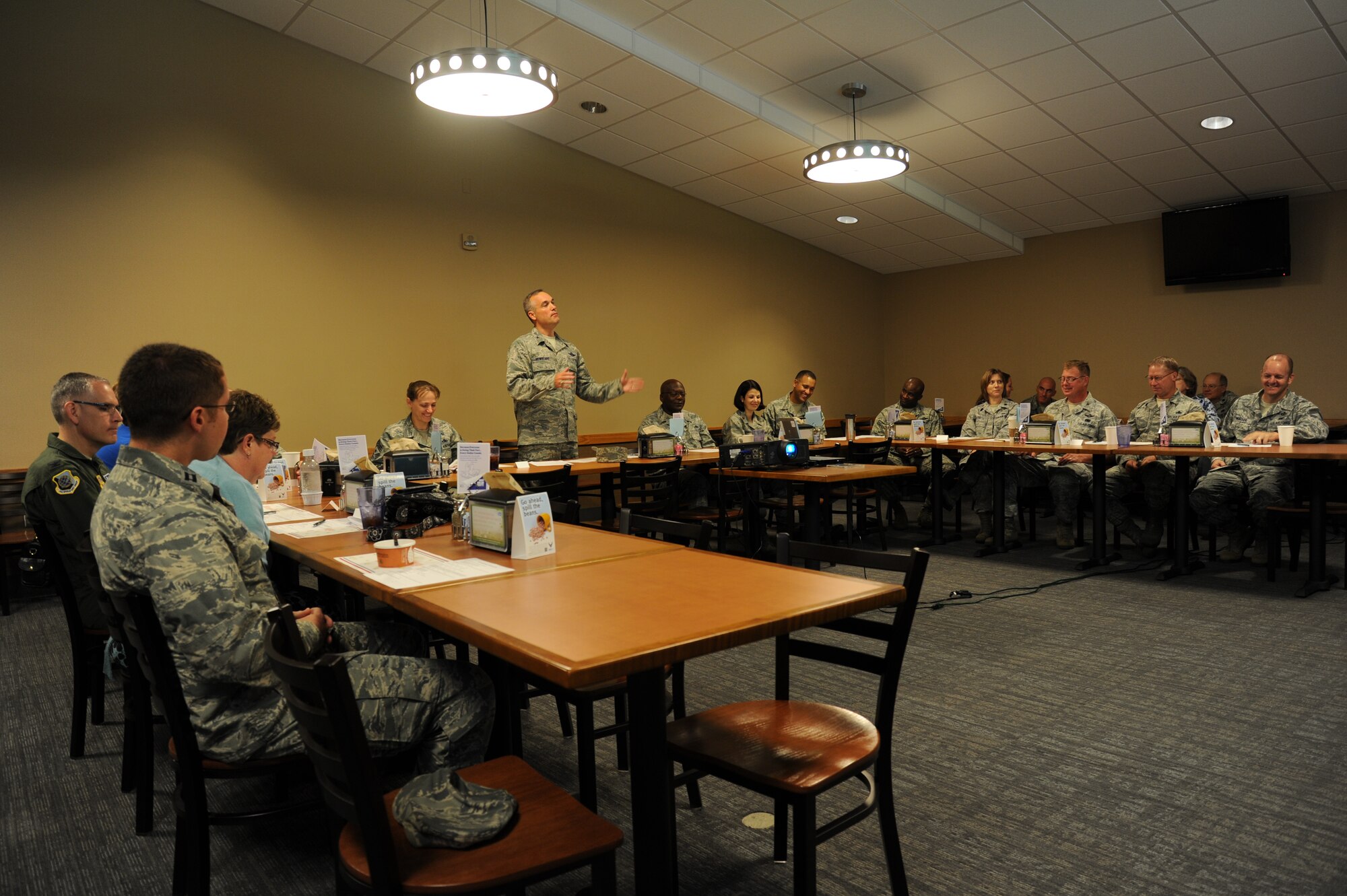 Col. Brian Newberry, 92nd Air Refueling Wing commander, speaks about Women's Equality Day at Fairchild Air Force Base, Wash., Aug. 26, 2013. Congress signed the 19th Ammendment on Aug. 26, 1920, giving women in the U.S. the right to vote. (U.S. Air Force photo by Airman 1st Class Janelle Patiño/Released)