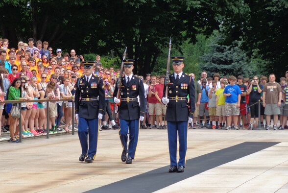 WRIGHT-PATTERSON AIR FORCE BASE, Ohio - (On the far right) Army Spc. Thomas Ozio, son of Chief Master Sgt. Shirley Ozio, 445th Logistics Readiness Squadron, and Staff Sgt. Daniel Ozio, 445th Civil Engineer Squadron, serves as a Sentinel at the Tomb of the Unknown Soldier, Arlington National Cemetery, Washington, D.C. (Courtesy photo)