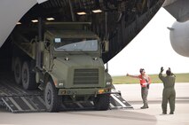 Members from four Airlift Control Flight units instruct members of the Naval Mobile Construction Battalion 17 in Colorado Springs, Colo., Aug. 24, during the annual AFRC-sponsored air mobility exercise, "Patriot Express." The ALCF is responsible for the training of Air Force and sister service units on how to move by air. They instruct over 400 units in preparing and loading their mobility equipment for air shipment. (U.S. Air Force photo/SrA. Kelly Galloway) 