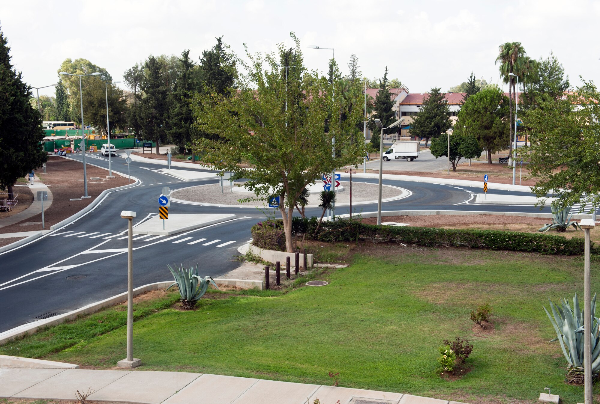A new roundabout is located at the corner by the wing headquarters’ building with one exit closed off Aug. 22, 2013, Incirlik Air Base, Turkey.  Road construction is slated to be completed November 2013. (U.S. Air Force photo by Senior Airman Daniel Phelps/Released)