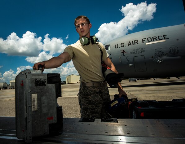 Senior Airman Cody Richman, 437th Aircraft Maintenance Squadron C-17 Globemaster III flying crew chief, prepares to inspection a C-17 Aug. 12, 2013, at Joint Base Charleston – Air Base, S.C. Richman ensures the aircraft is working properly and is safe to fly at a moment’s notice. (U.S. Air Force photo/ Senior Airman Dennis Sloan)