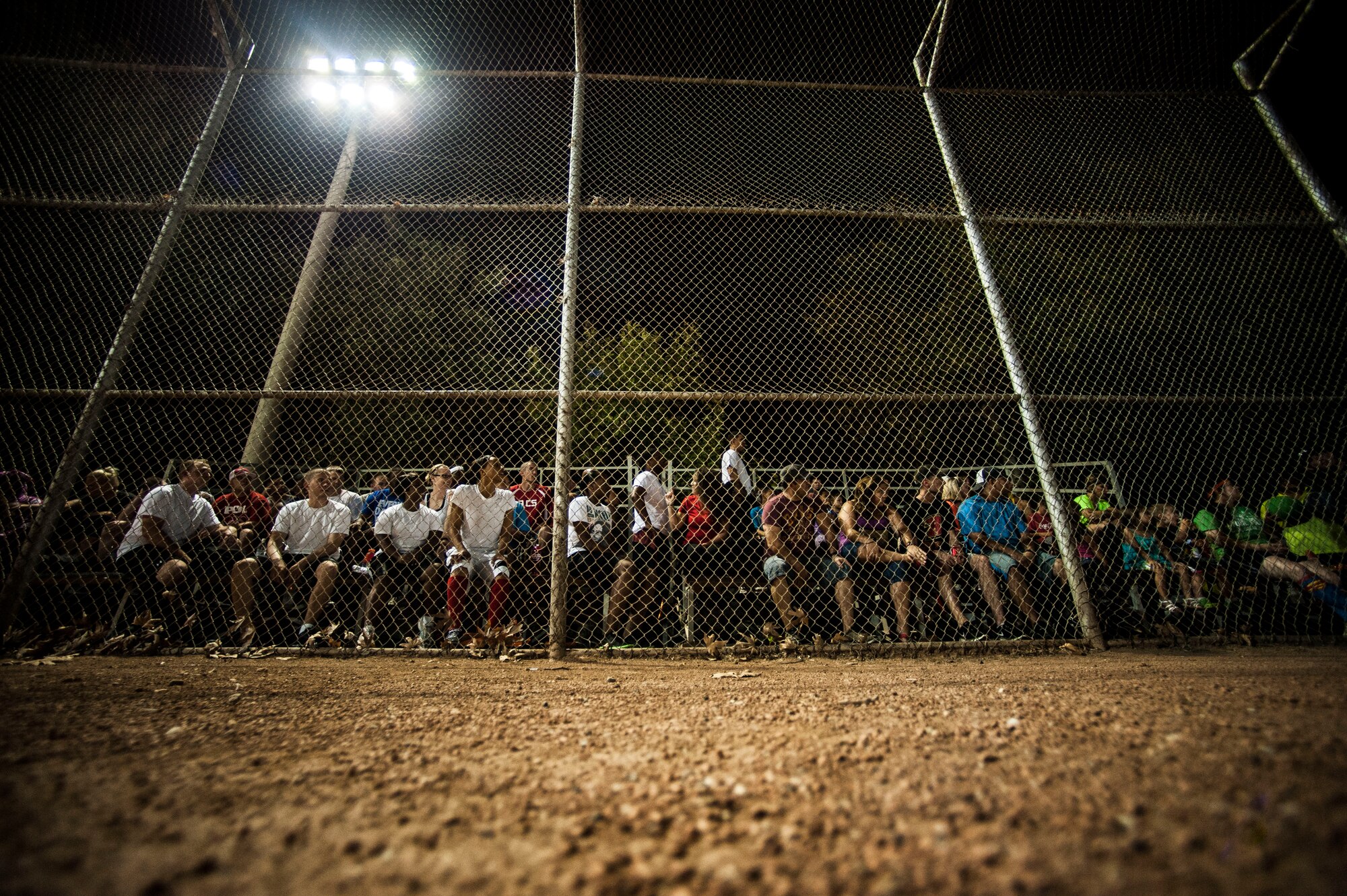 Servicemembers and dependents listen for directions before a kickball tournament Aug. 23, 2013, at Incirlik Air Base, Turkey.  Airmen and civilians from the 39th Logistics Readiness Squadron won against the 39th Air Base Wing command post, 39th Force Support Squadron and 39th ABW Wing Staff Agencies. (U.S. Air Force photo by Airman 1st Class Nicole Sikorski/Released) 