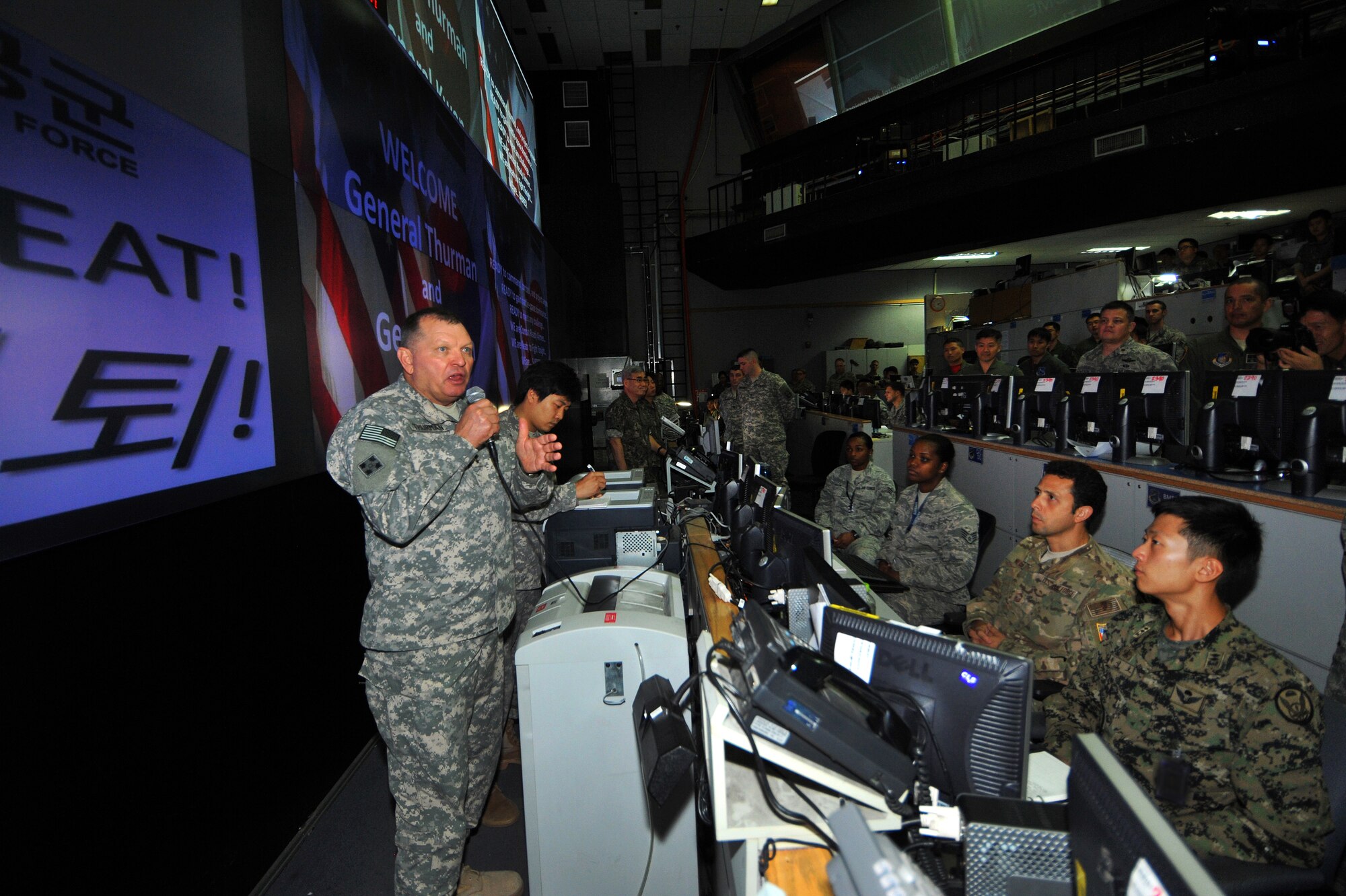 Gen. James Thurman, U.S. Forces Korea commander, speaks to US, Australian, and Republic of Korea Airmen about the importance of their work during a visit to the Air Operations Center 2013 at Osan Air Base, Republic of Korea, Aug. 26, 2013 during exercise Ulchi Freedom Guardian.  The annual exercise, conducted by the ROK and U.S. Combined Forces Command, runs through Aug. 30. (U.S. Air Force photo/Staff Sgt. Emerson Nuñez)