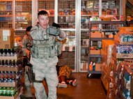 KUNSAN AIR BASE, Republic of Korea -- Airman 1st Class Spencer Rumley, 8th Security Forces Squadron response team member, yells at an "active shooter" during a training scenario Aug. 23, 2013. Asymmetric Threat, a division of Analytical Services Incorporated, trained Rumley and 20 other security forces Airmen in a course designed to prepare personnel for dangerous and unpredictable situations. (U.S. Air Force photo by Senior Airman Armando A. Schwier-Morales/ Released)