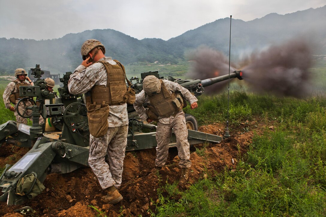 Artillerymen direct fire an M777A2 155 mm lightweight howitzer at the Rodriguez Live-Fire Complex Aug. 21 as part of Korean Marine Exchange Program 13-8. For artillerymen, direct fire is used when the enemy comes within 2000 meters of the battery's location. It no longer requires coordinates to plot and engage, but relies on the accuracy of the artilleryman looking through the gun's sights. The artillerymen are with Battery I, 3rd Battalion, 11th Marine Regiment, currently assigned to 12th Marine Regiment, 3rd Marine Division, III Marine Expeditionary Force under the unit deployment program.